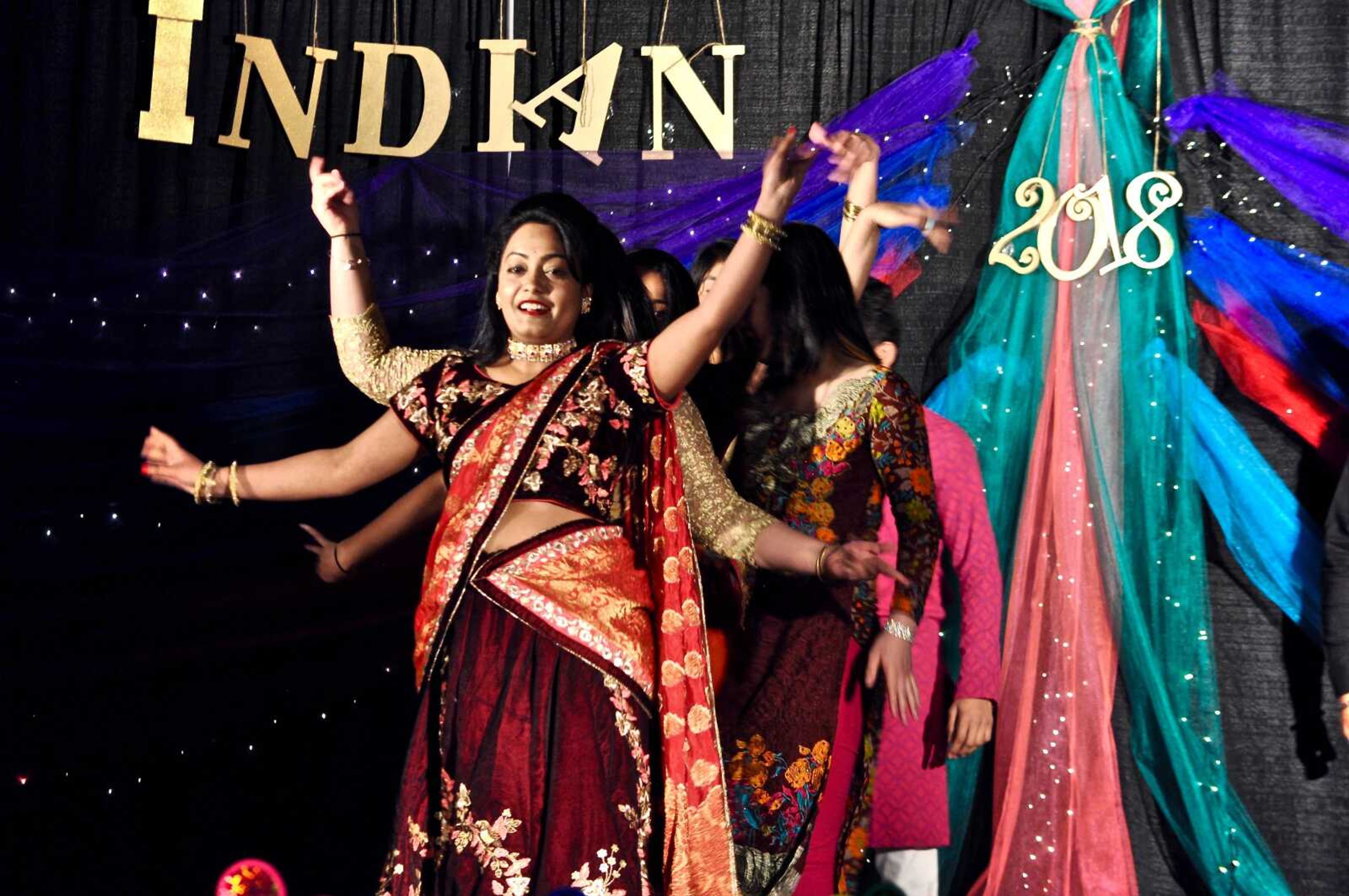 Monica Balla and several other dancers perform at ISSA's Indian Night at the student Recreation Center on March 23.
