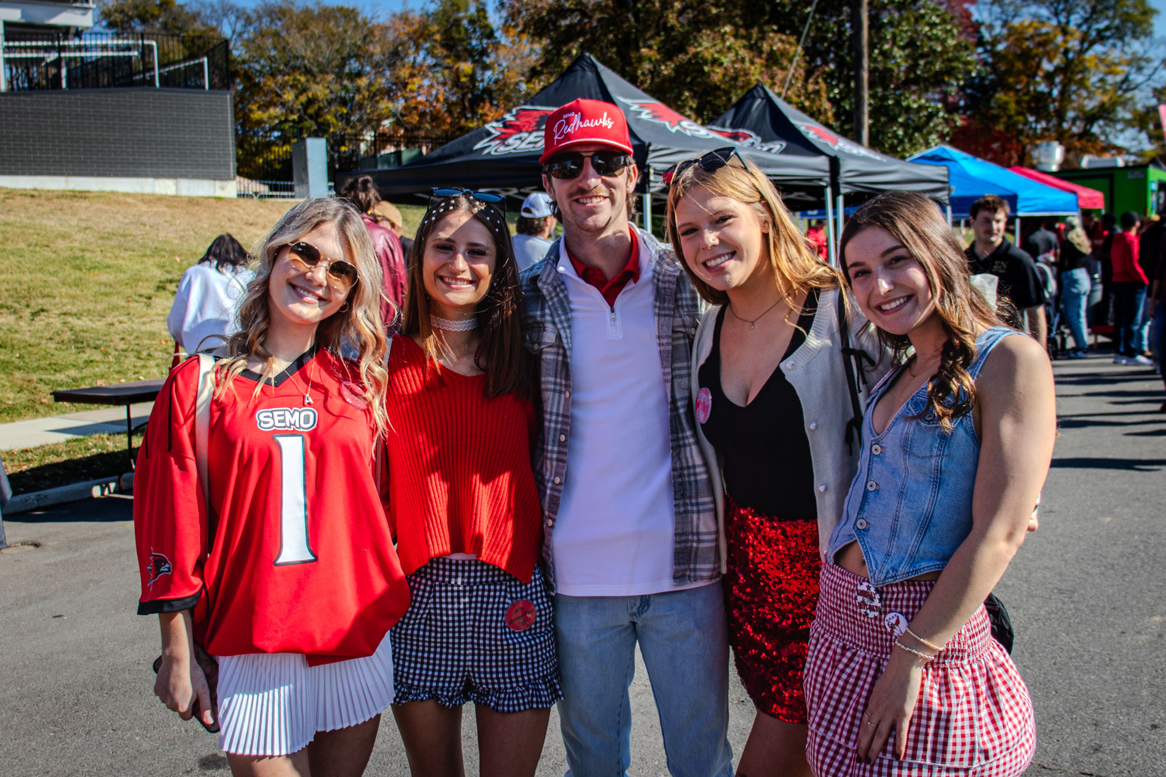 SEMO students pose for a photo at the Alumni Association Tailgate. 