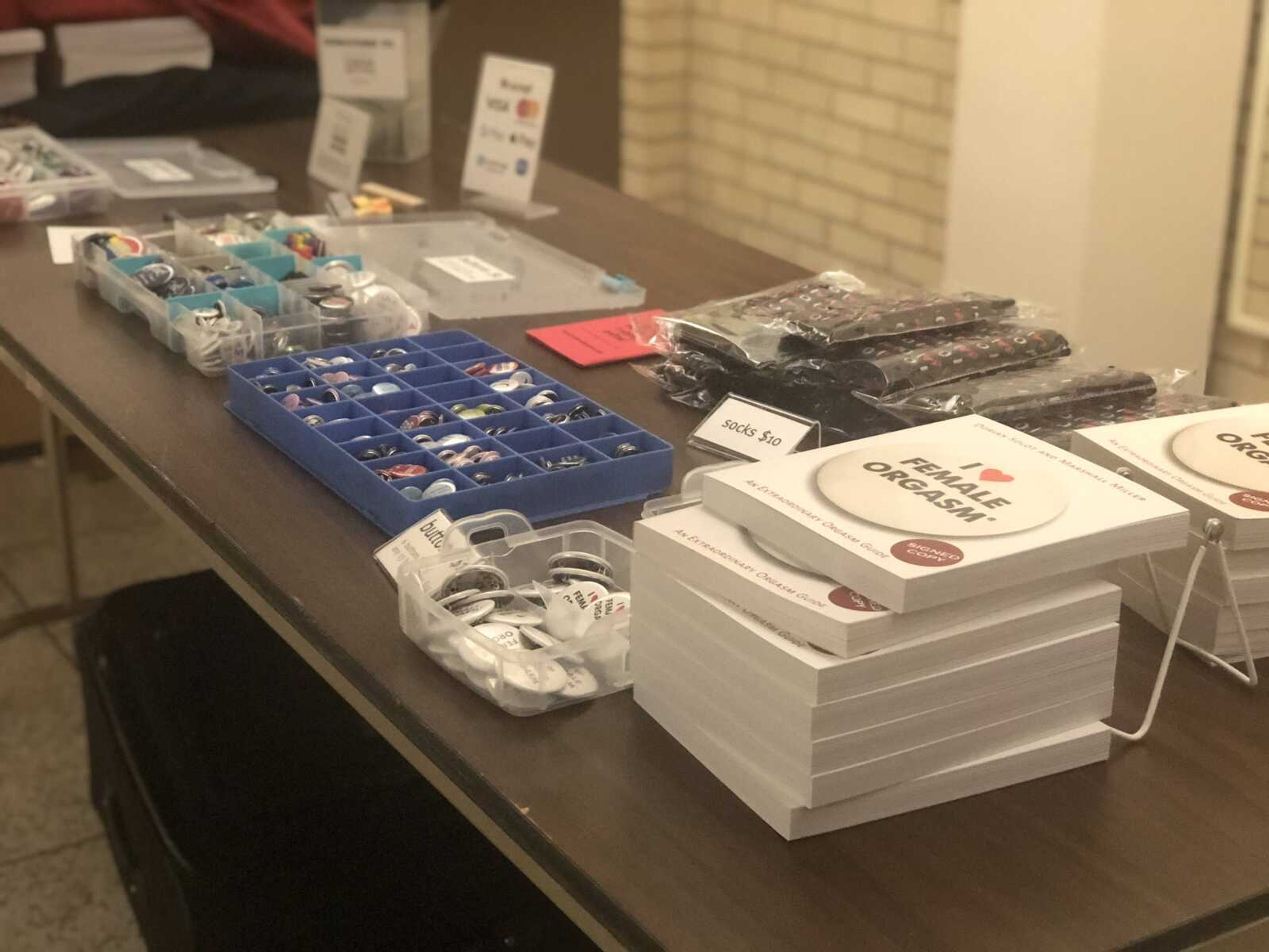 Merchandise was available for purchase at the event, including books, socks and buttons.