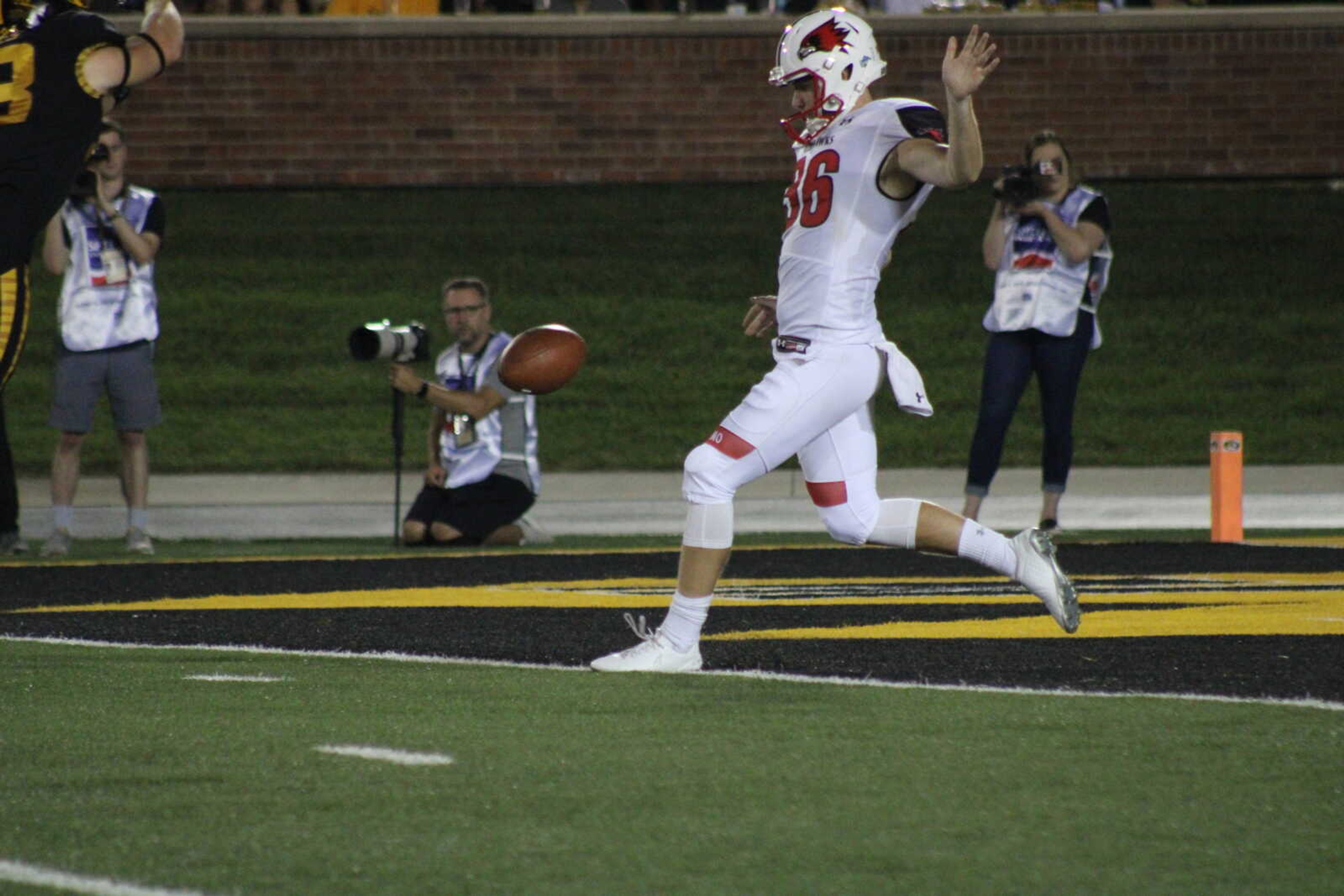 Senior punter Jake Reynolds drops the ball to punt during a 50-0 loss to The University of Missouri on Saturday, Sept. 14.