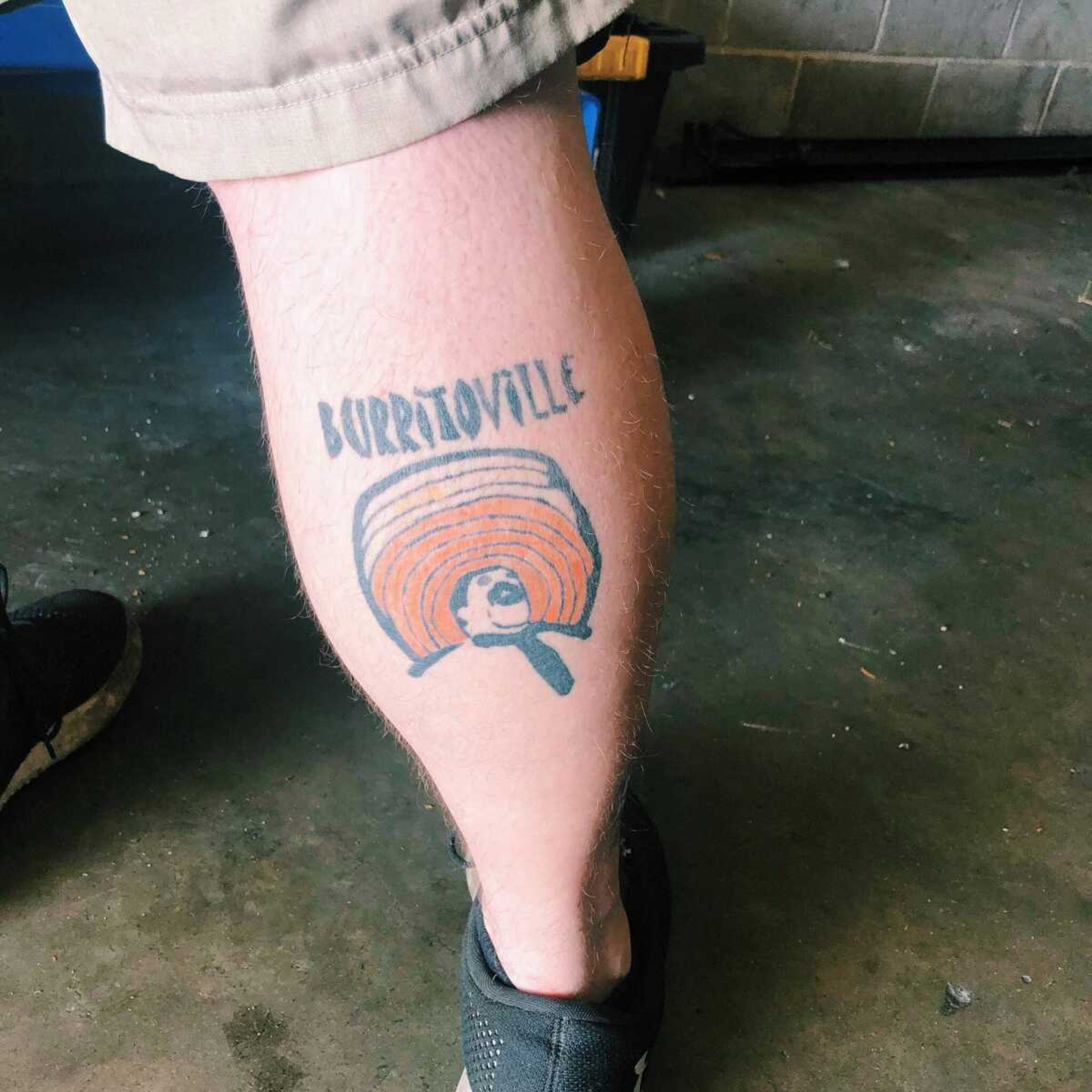 A Sept. 28 photo posted on the restaurant's Facebook page displays a customer's Burrito-Ville tattoo.
