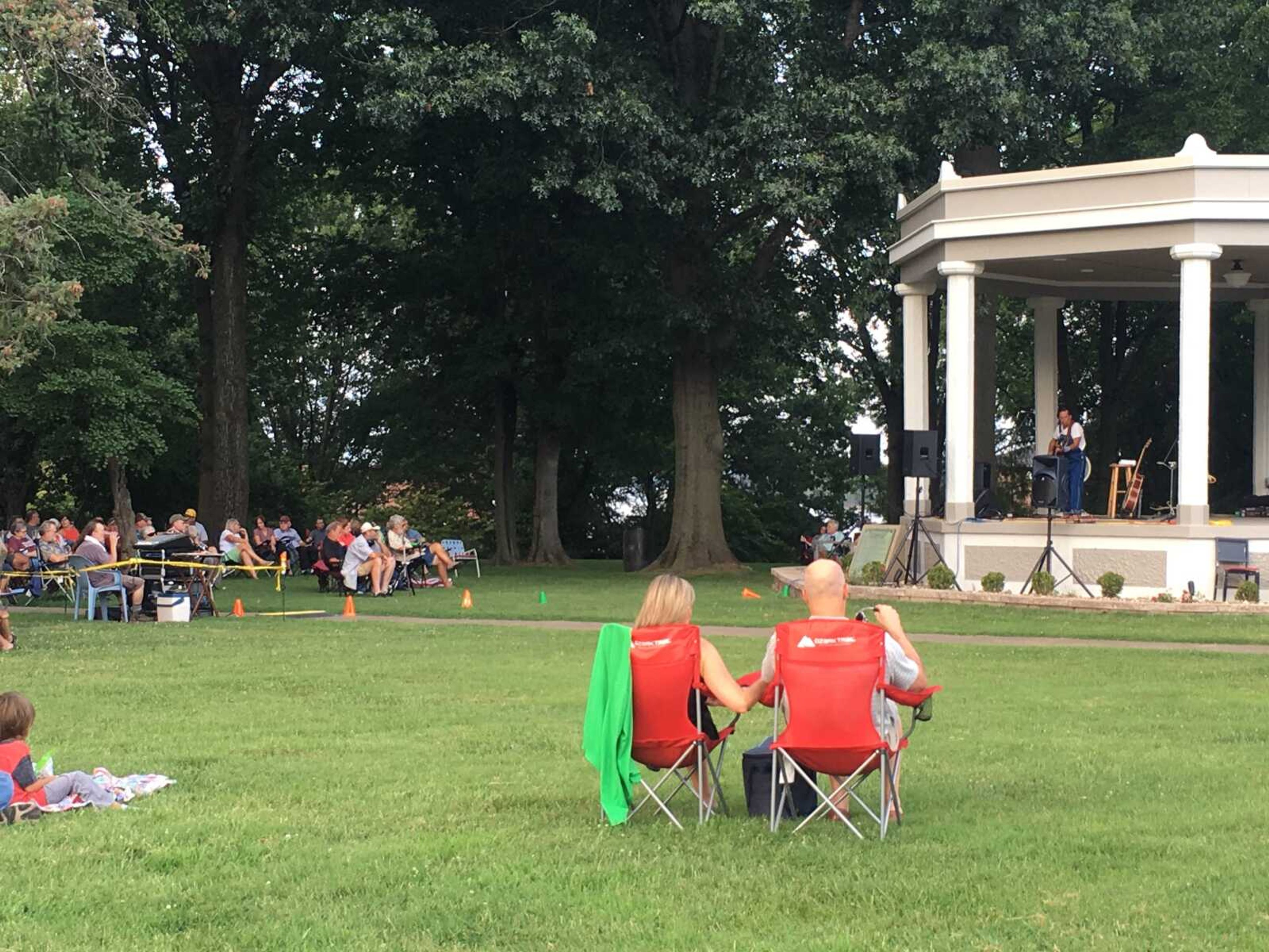 A crowd listens to Jimmy Davis perform at the first Tunes at Twilight of the fall season.