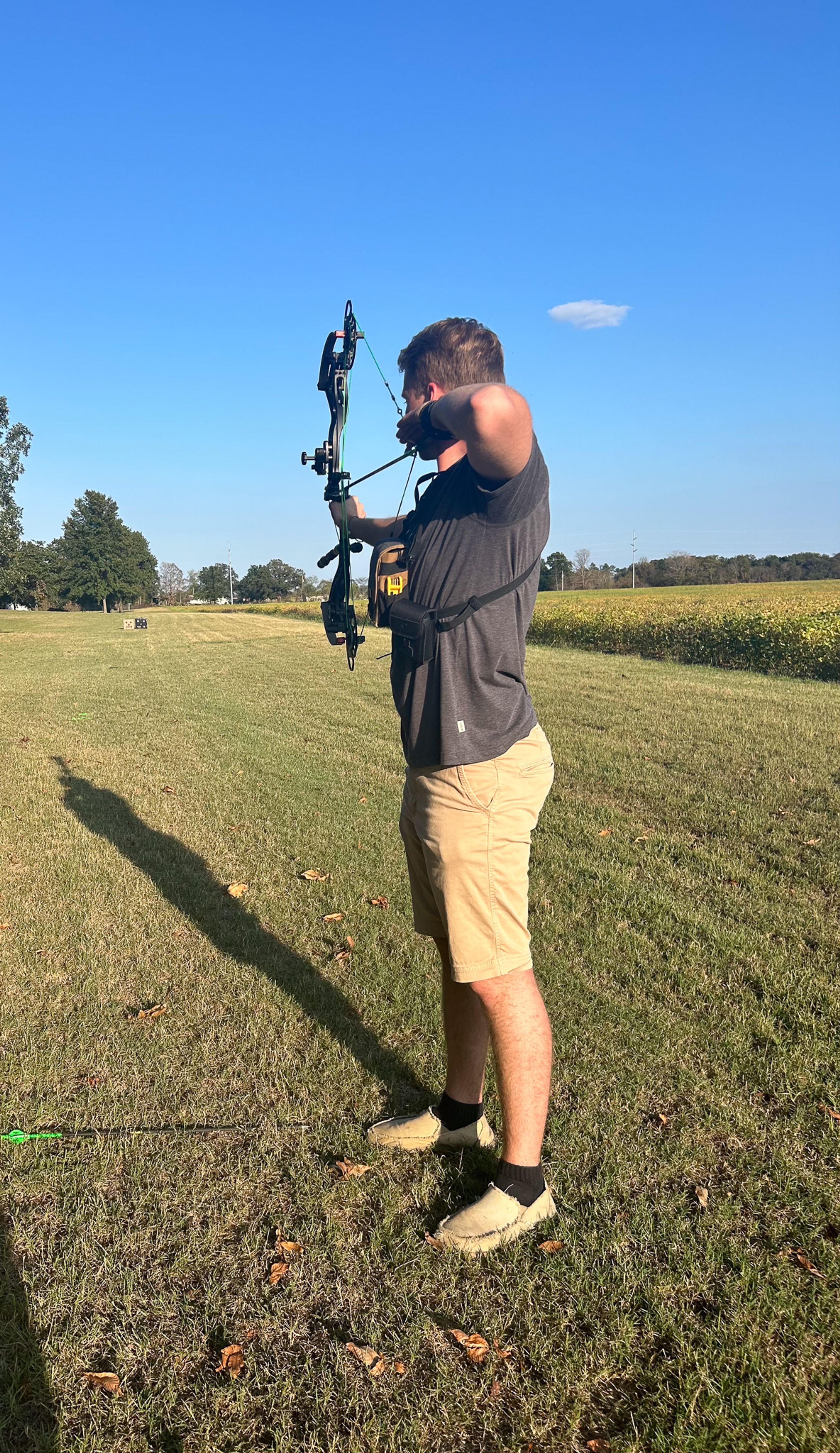 Bryson Klunk shoots his bow, getting ready for deer season.