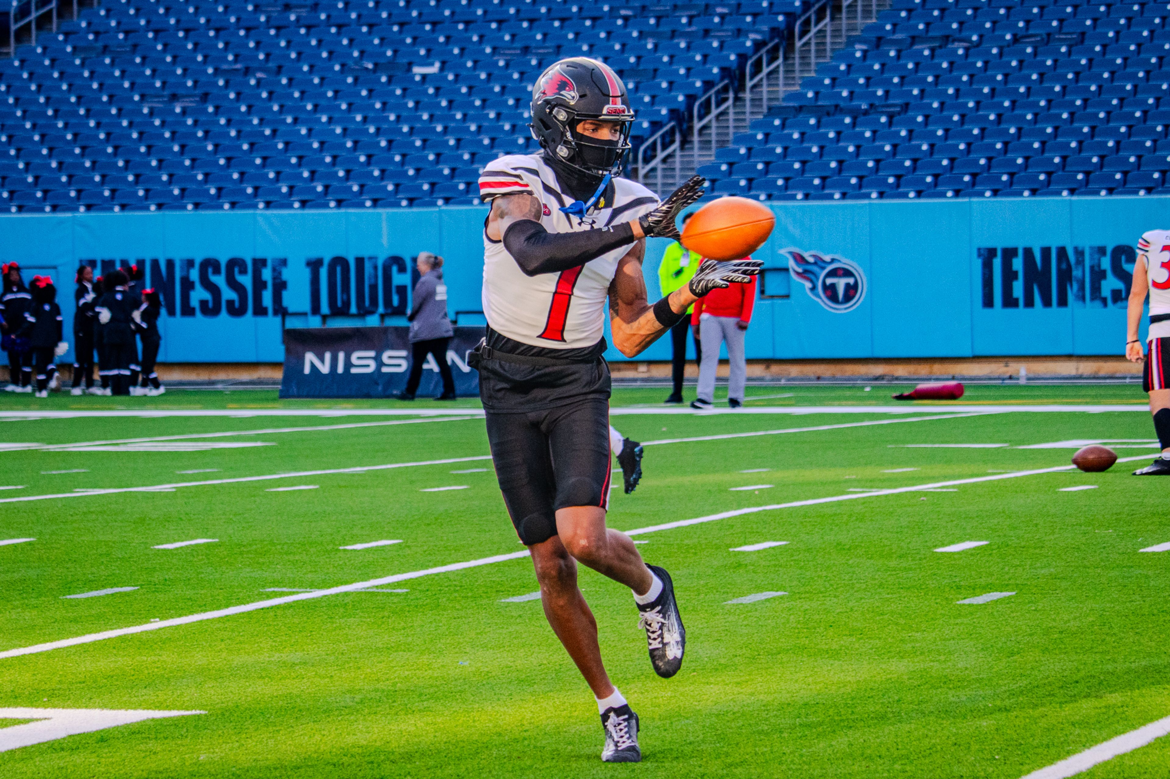 Junior wide receiver Tristan Smith warms up before the game against TSU. 