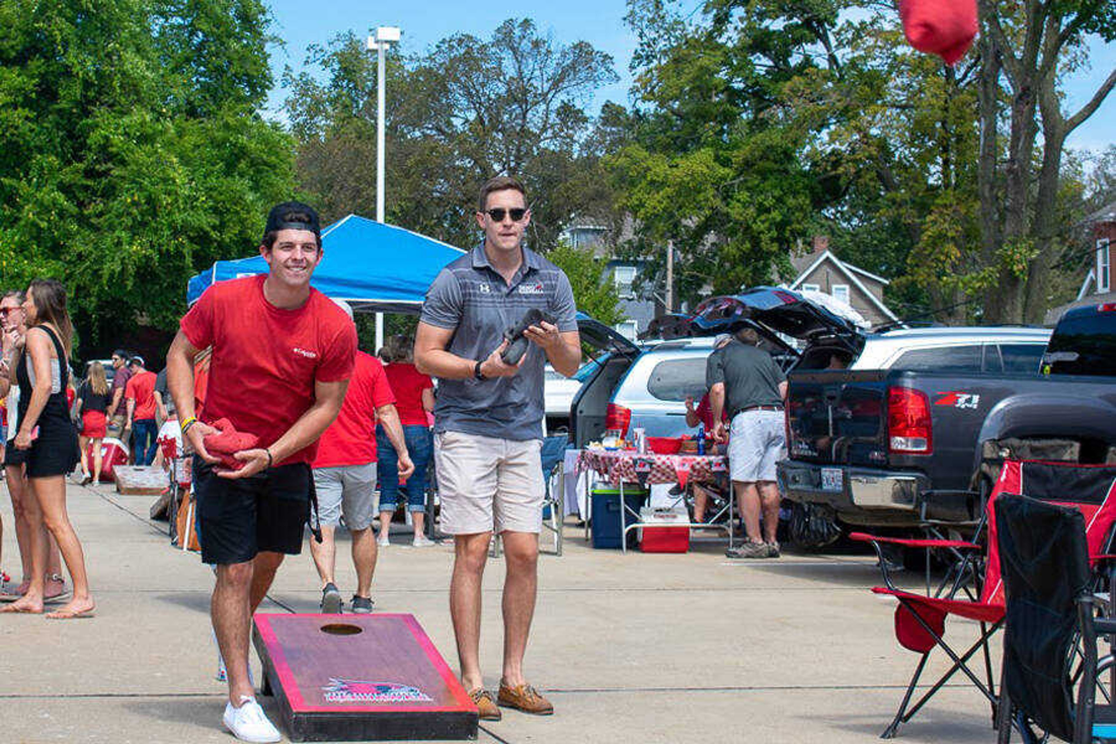 Daniel Bergholdt and Chase Urhahn playing a game of cornhole at the SEMO football tailgate on Saturday, &#8206;Sept. &#8206;21, &#8206;2019.