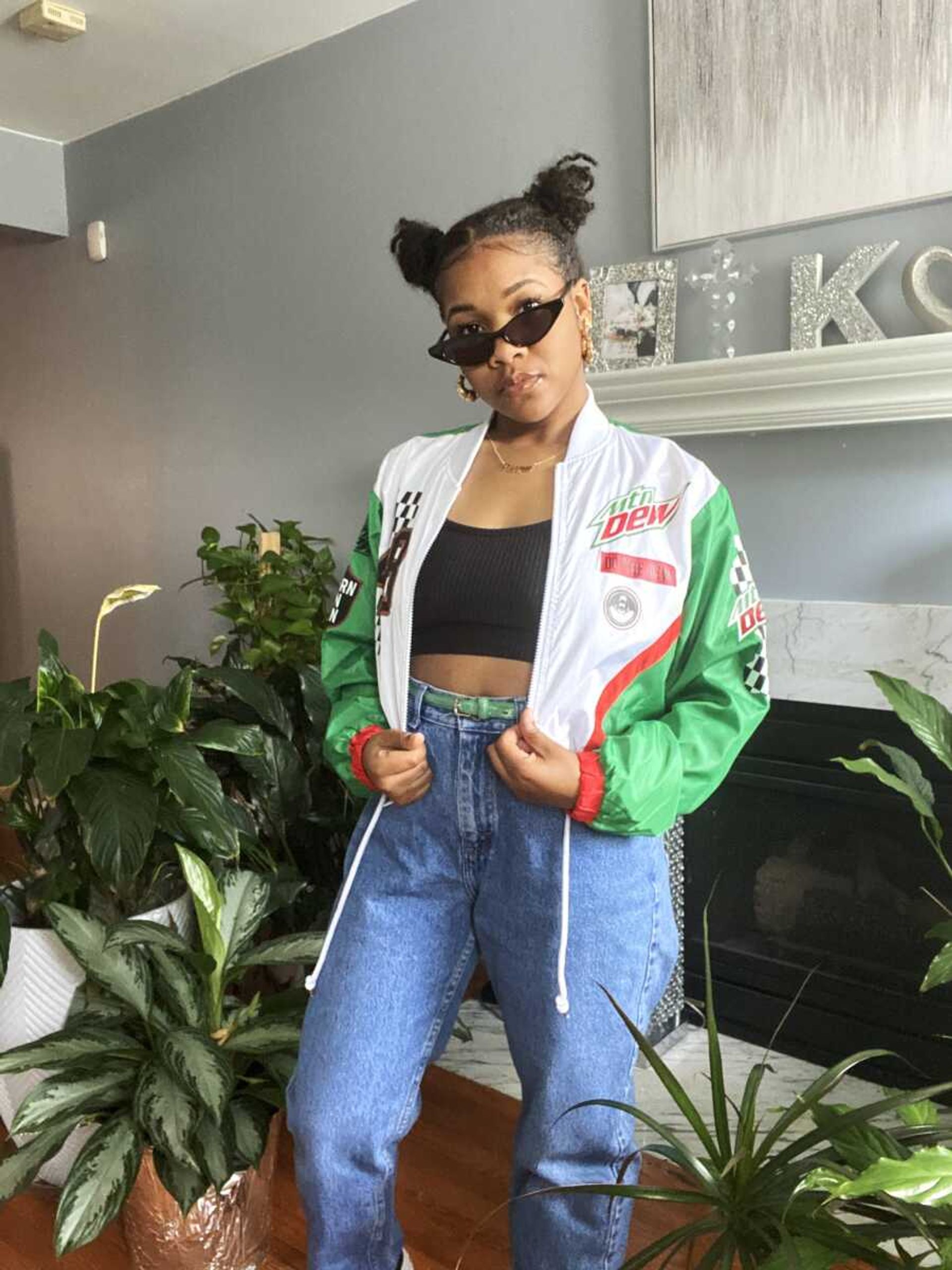 SEMO Alumna Karis Gamble models for her resale thrift business Kare to Thrift. Her shop uses Instagram and Facebook to promote her unique, thrifted clothing items and show how they can be styled.