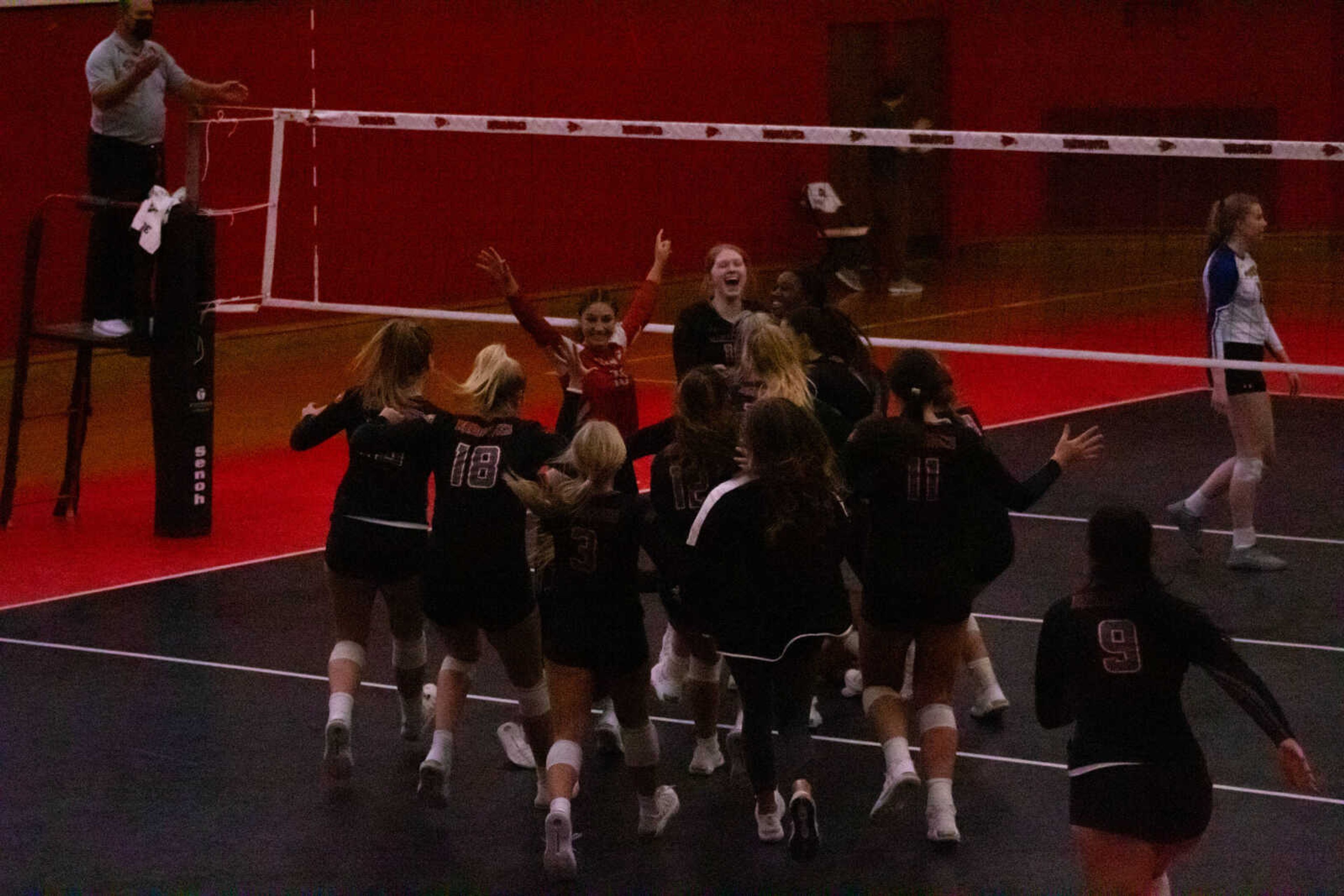 SEMO volleyball celebrates sweep against Morehead State on Nov. 13. The Redhawks defeated the Eagles 3-0, taking the OVC regular season title.