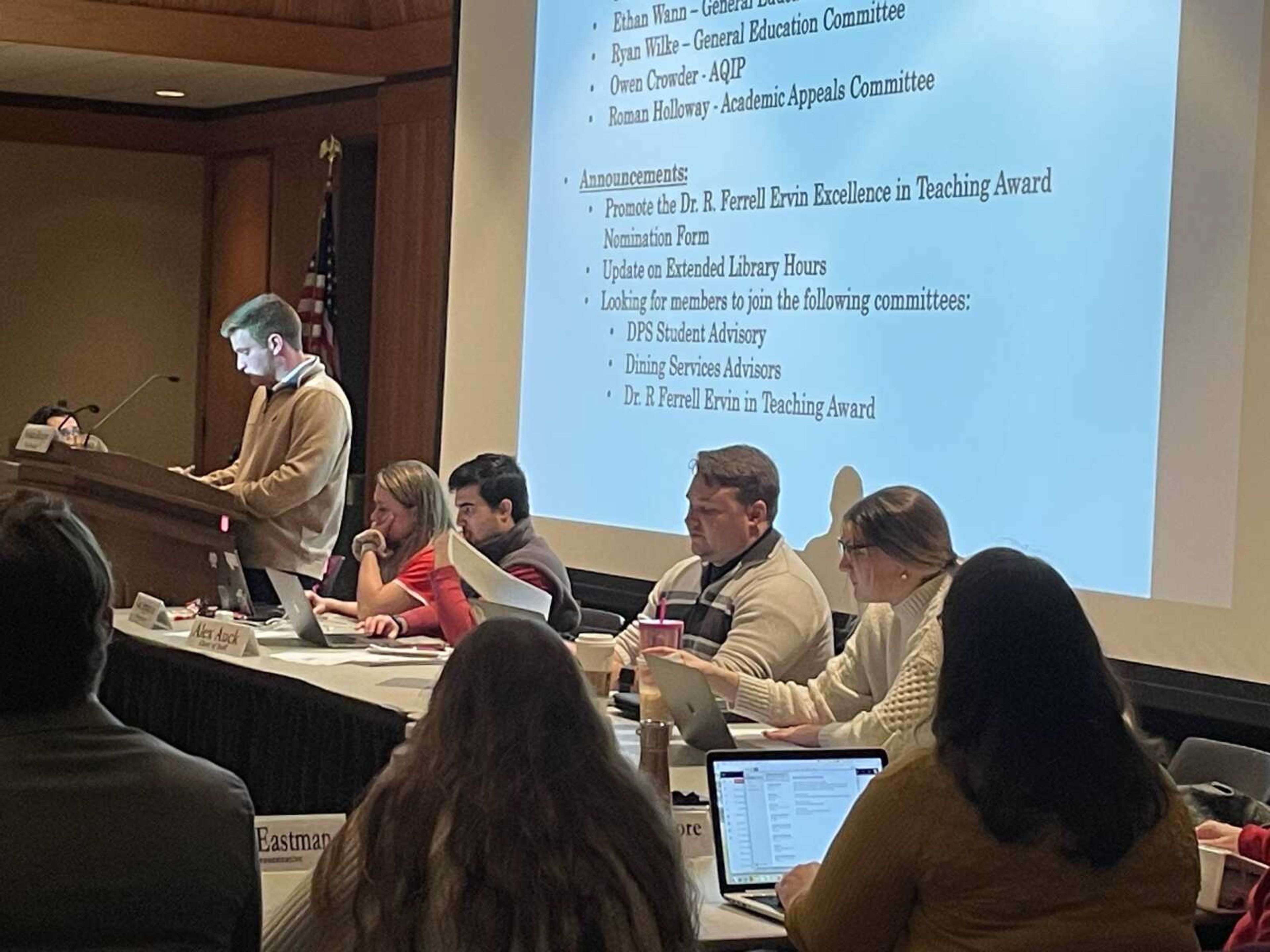 Joel Philpott announces information abotu the DPS Student Advisory during the Feb. 21 student government meeting. SGA is seeking more students to join the committee, which works directly with director of public safety Beth Glaus, Philpott says.
