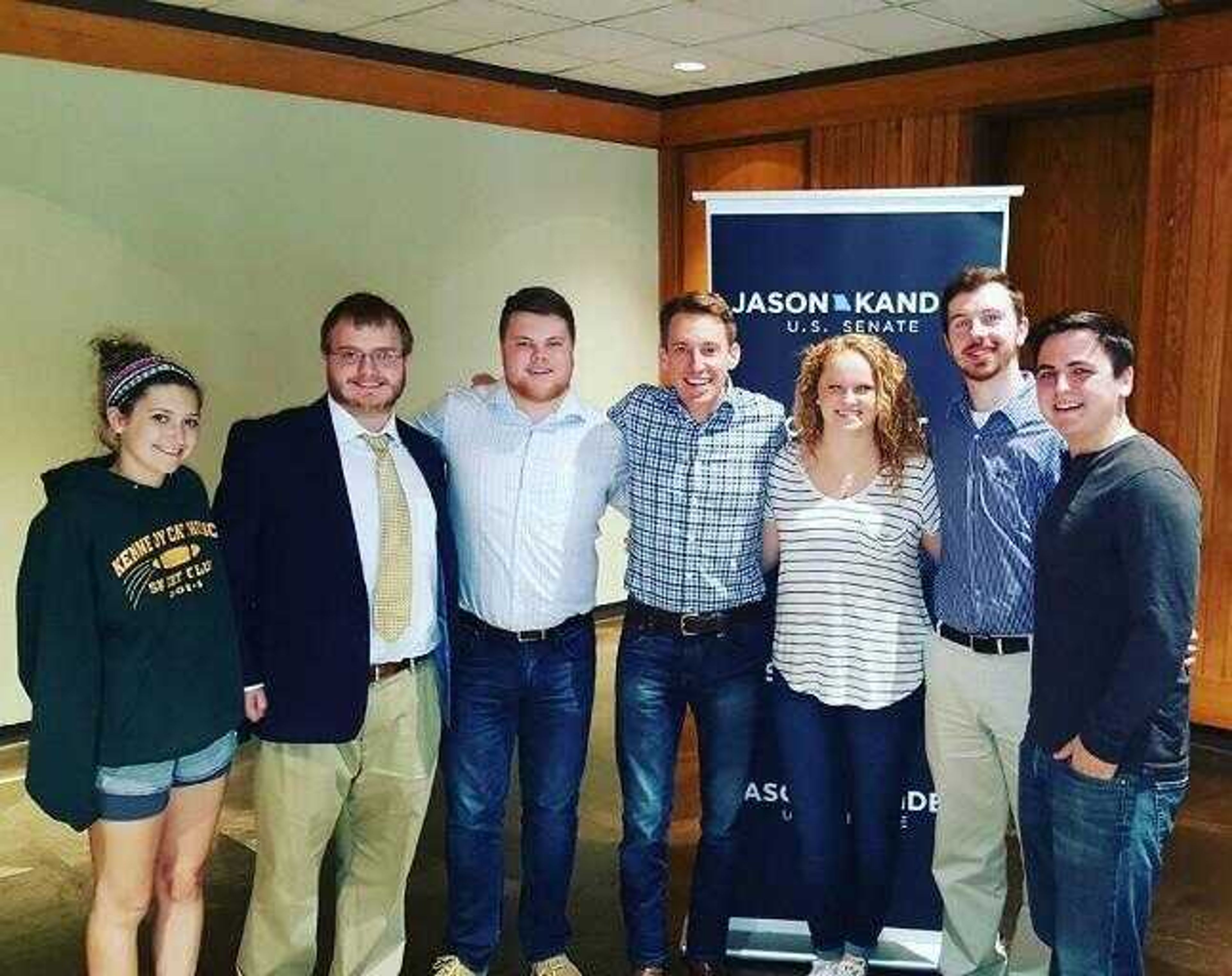 Members of the College Democrats pose for a group photo after hearing Jason Kander speak in October.
