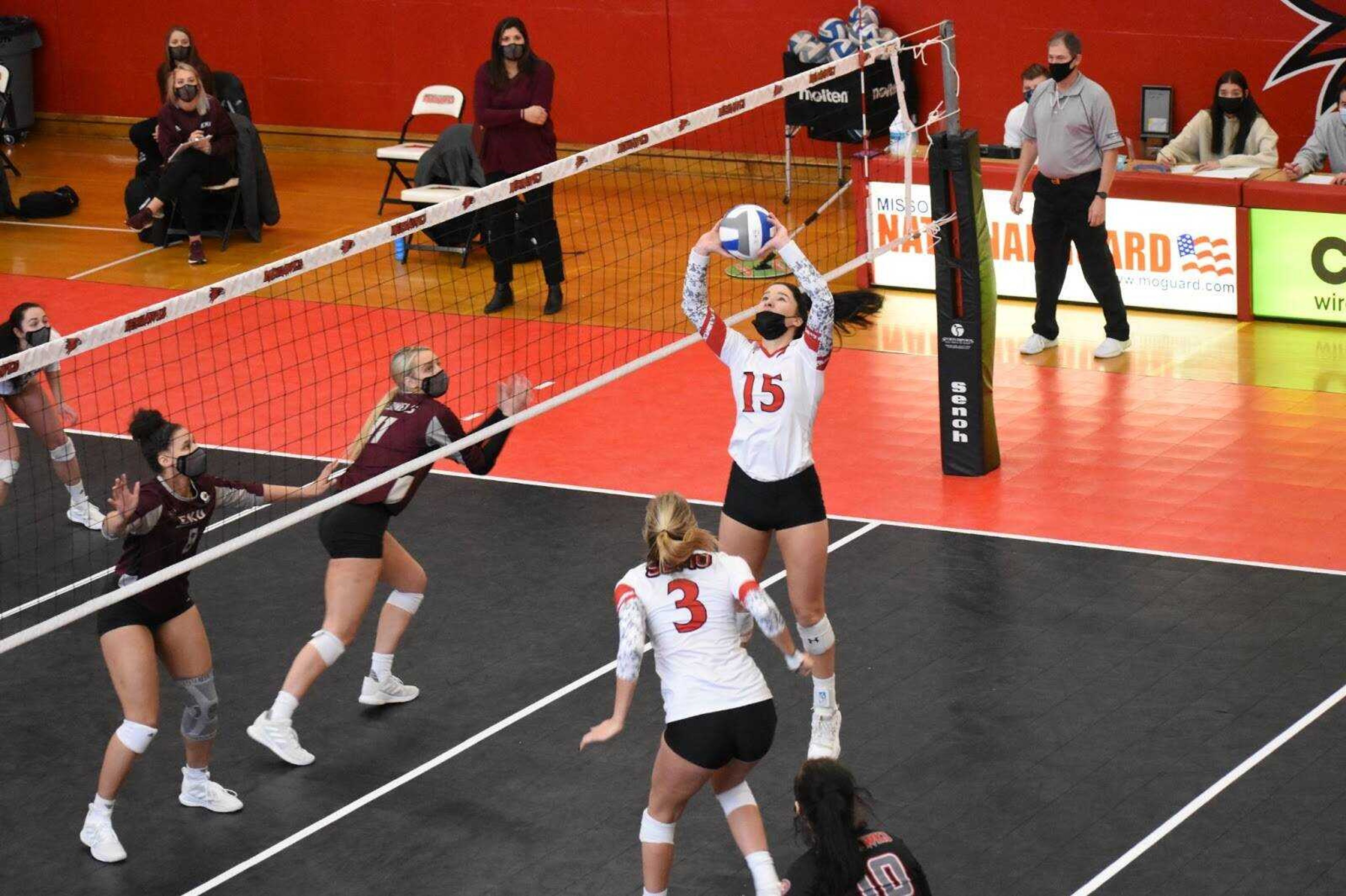 Junior setter Claire Ochs sets the ball for senior middle blocker Maggie Adams during a pair of four-set wins for Southeast over EKU on Feb. 14 at Houck Field House in Cape Girardeau.
