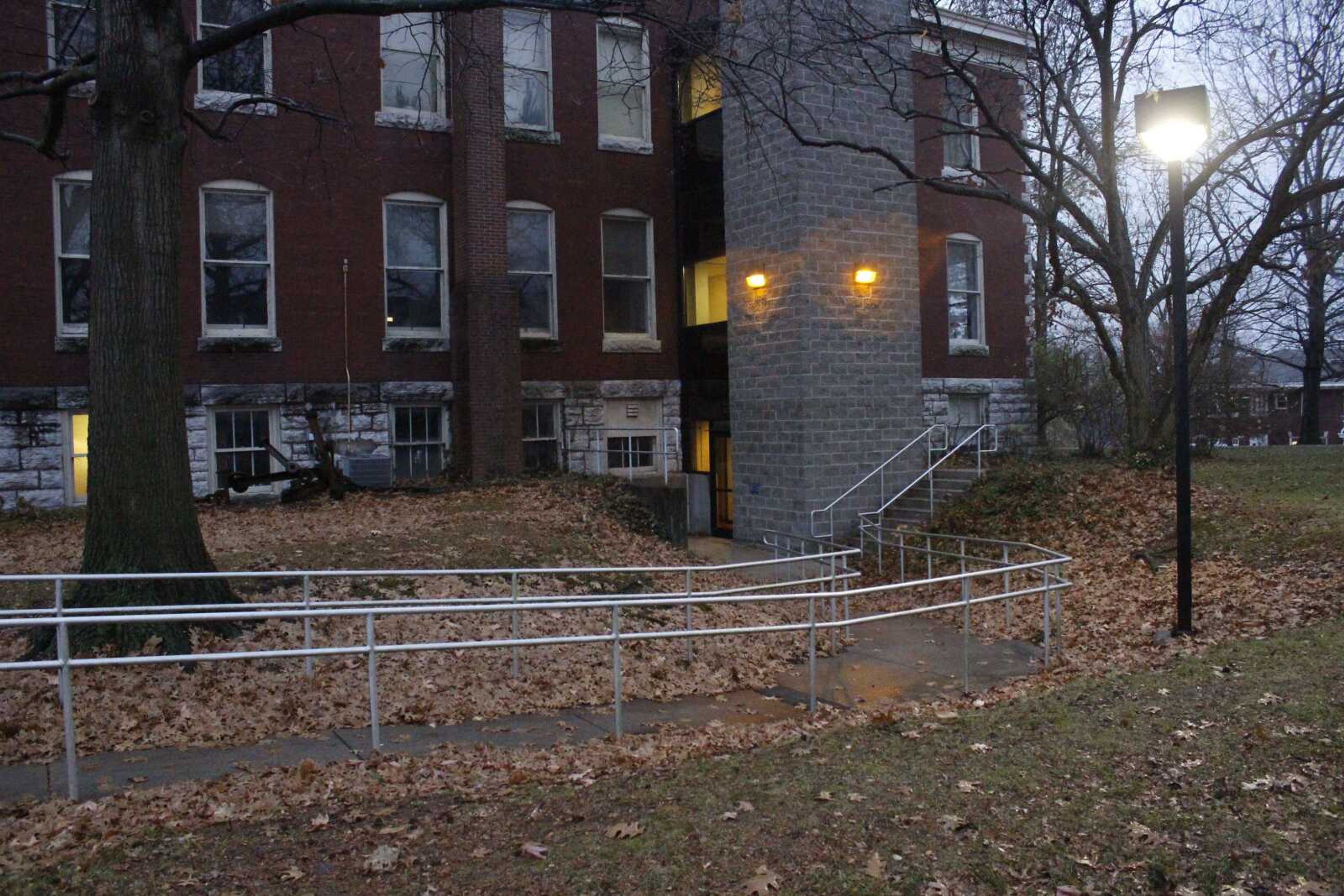 Ramps are located at several campus buildings to help with accessibility. This ramp leads to the elevator and stairs behind the Art Building.