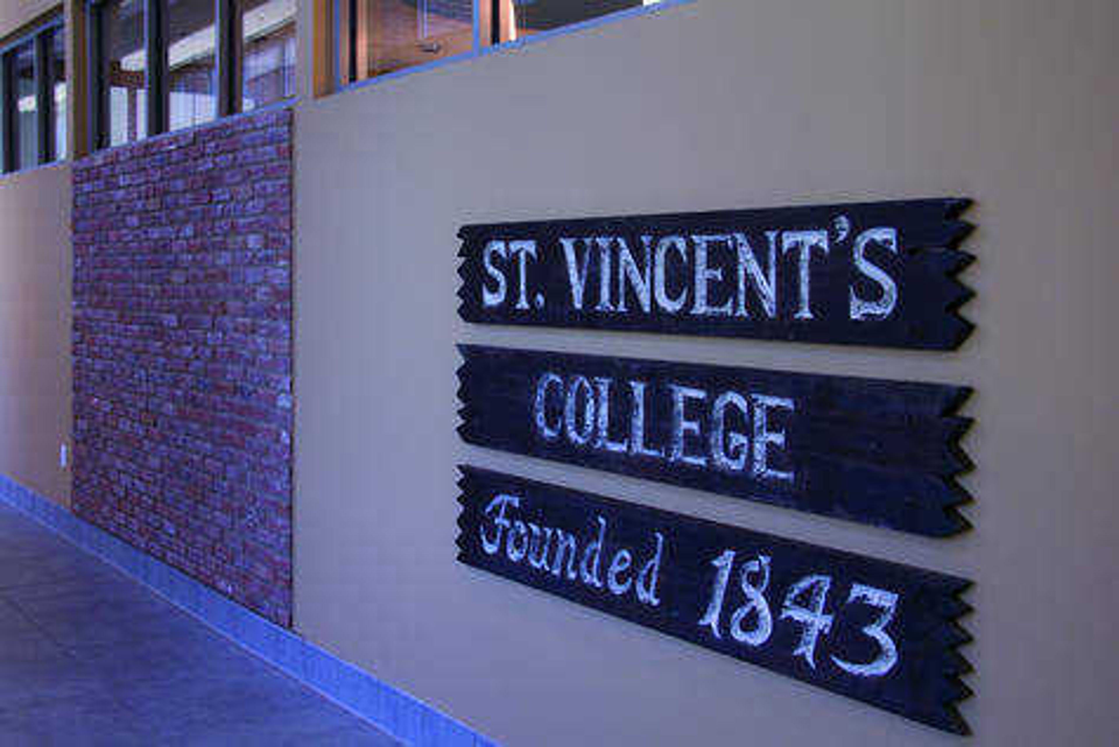 Two large pieces of the St. Vincent's College handball wall were placed in the new River Campus Center in order to preserve its history. Photo by Zarah Laurence