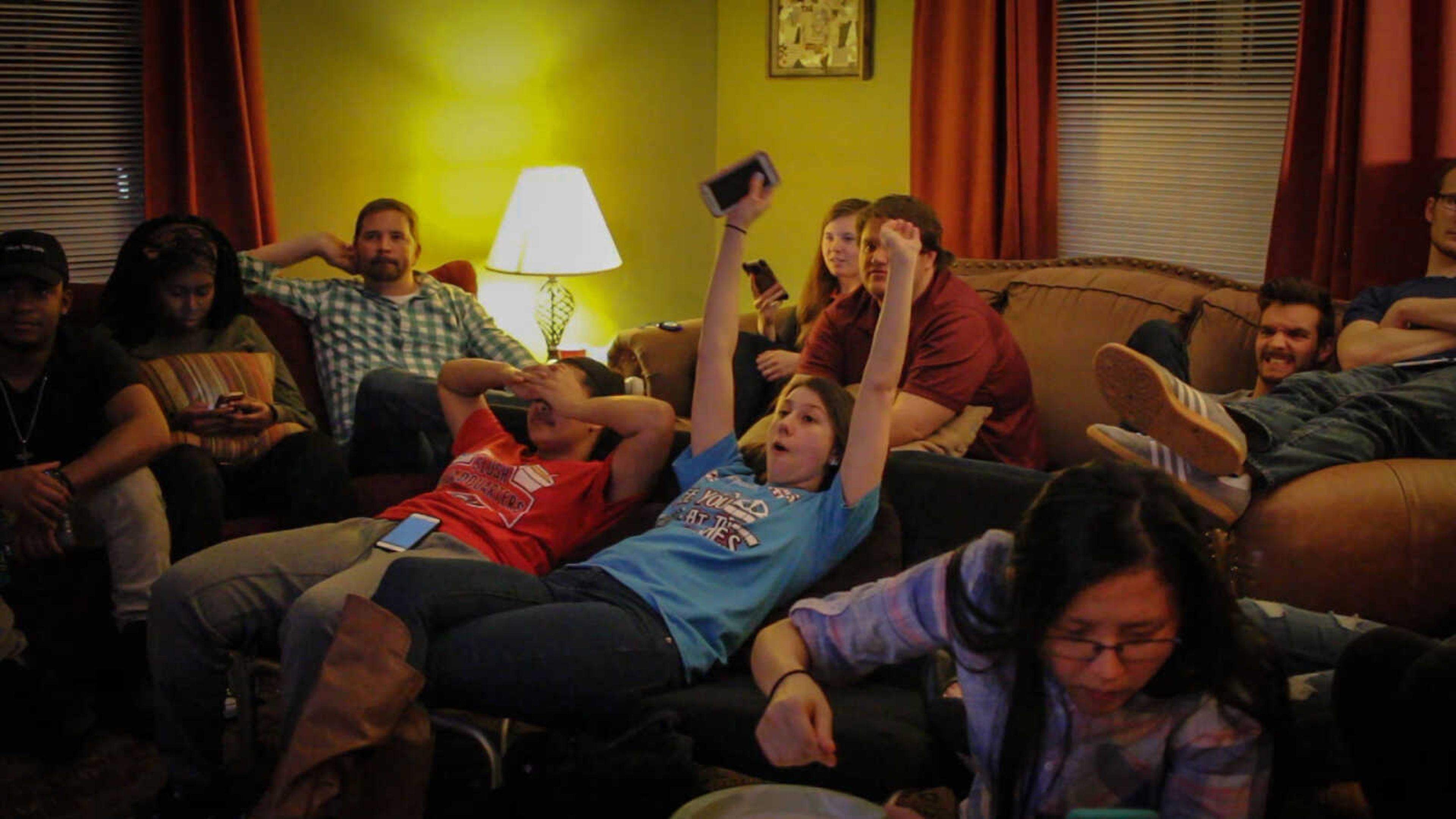 Students at the Ignite House celebrate during the Super Bowl.