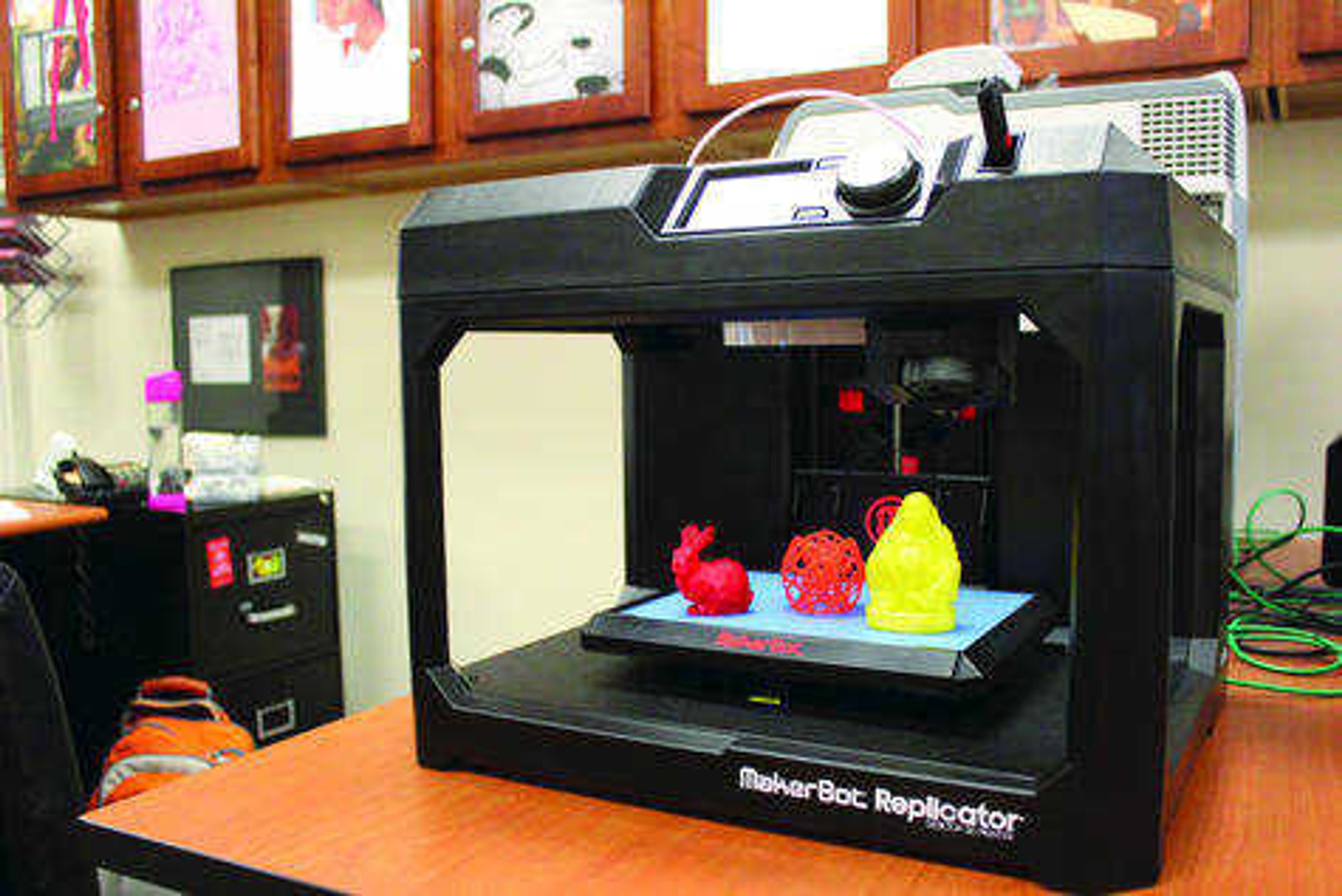 The Makerbot Replicator 3D Printer, along with other digital design programs, is a tool offered to Southeast students through the Heather MacDonald Greene Multimedia Center. Photos by Amber Cason