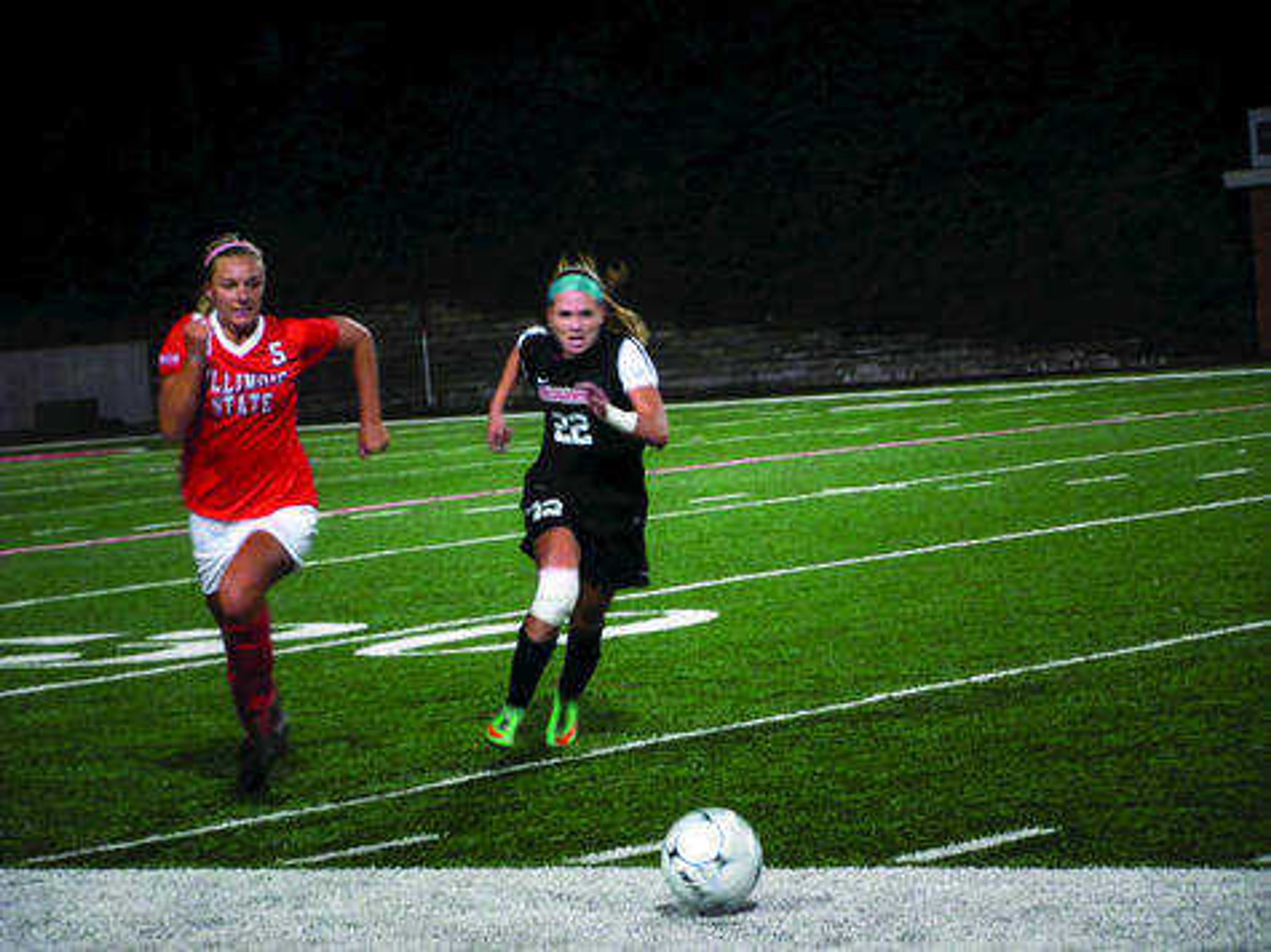 Sophomore midfielder/forward Natasha Minor (Right) running for the ball against an Illinois State player.