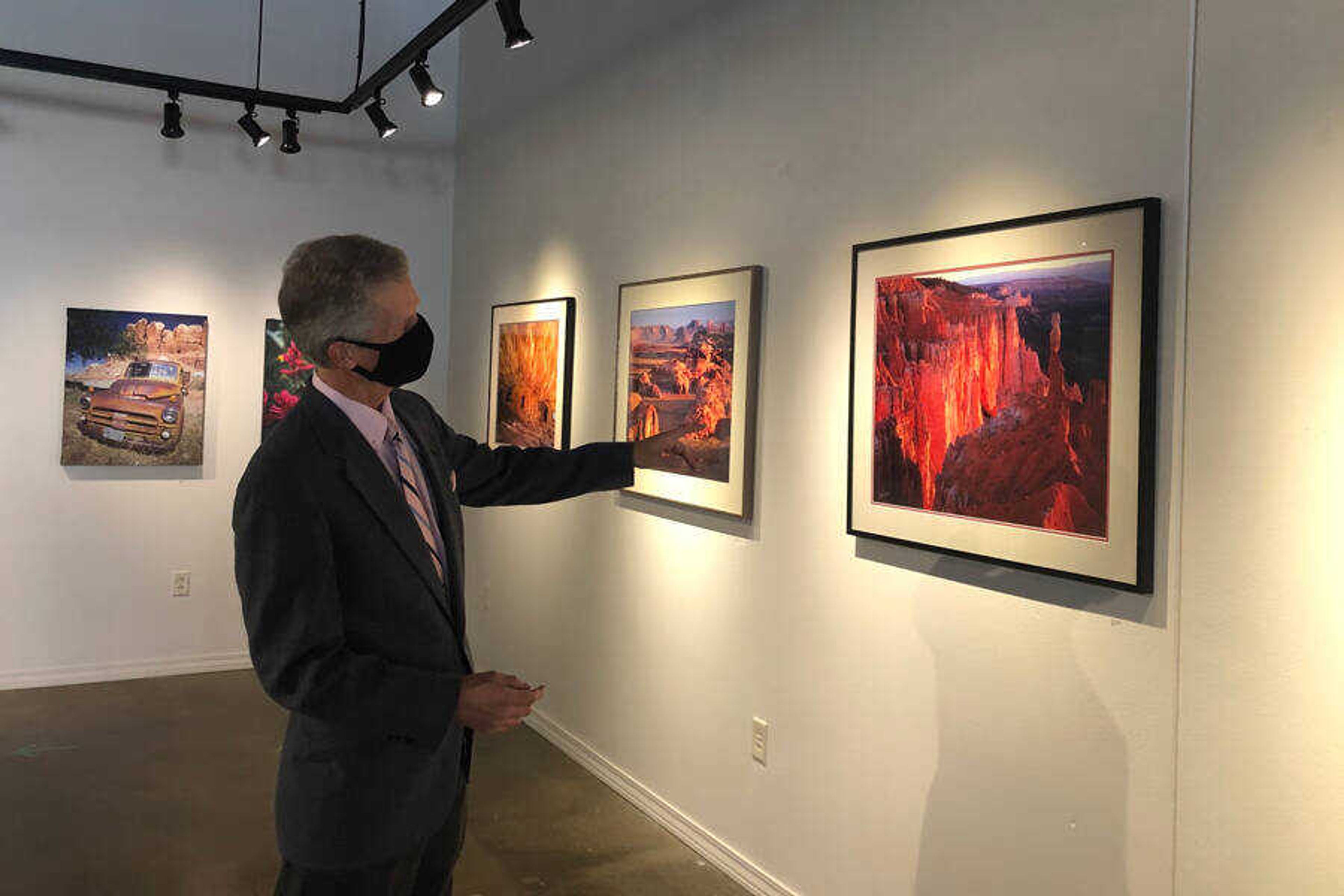 Brian Alworth, outdoor photographer and first alert meteorologist for KFVS, describes his outdoor photographs at his exhibition titled “30 Years of Photography.” The display will be up until Oct. 30 at the Southeast Missouri Council of Arts.
