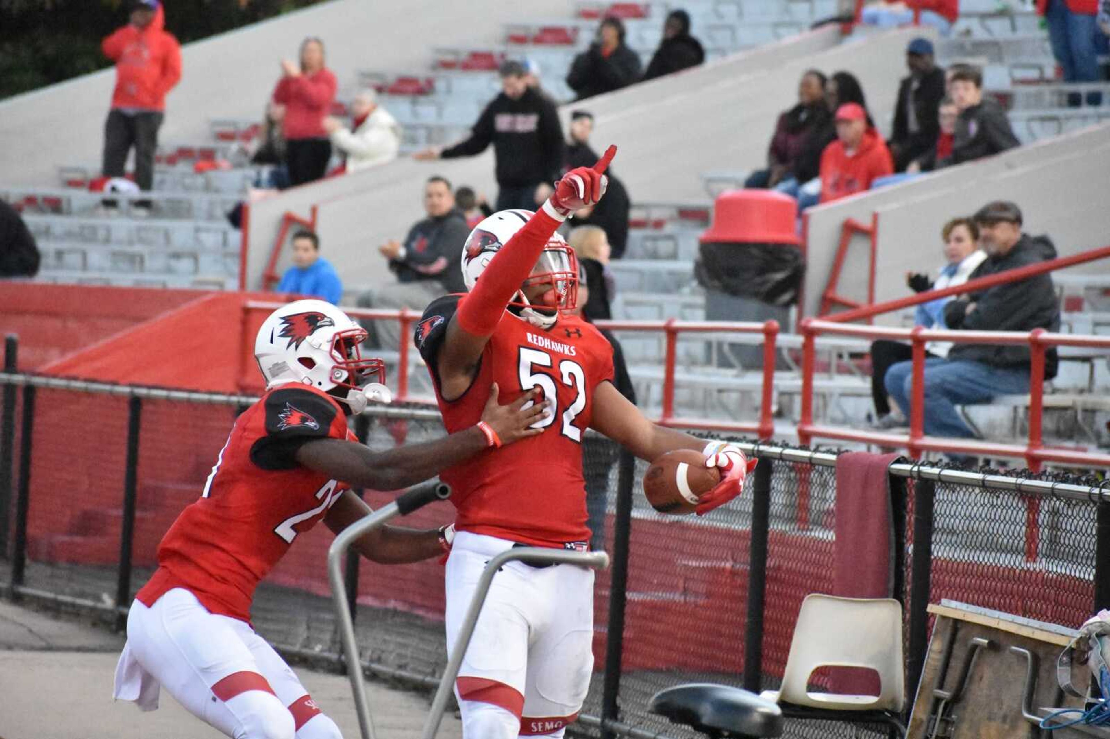 Sophomore outside linebacker Omardrick Douglas points to the fans after getting the game-sealing interception in the 38-32 win over Eastern Illinois.