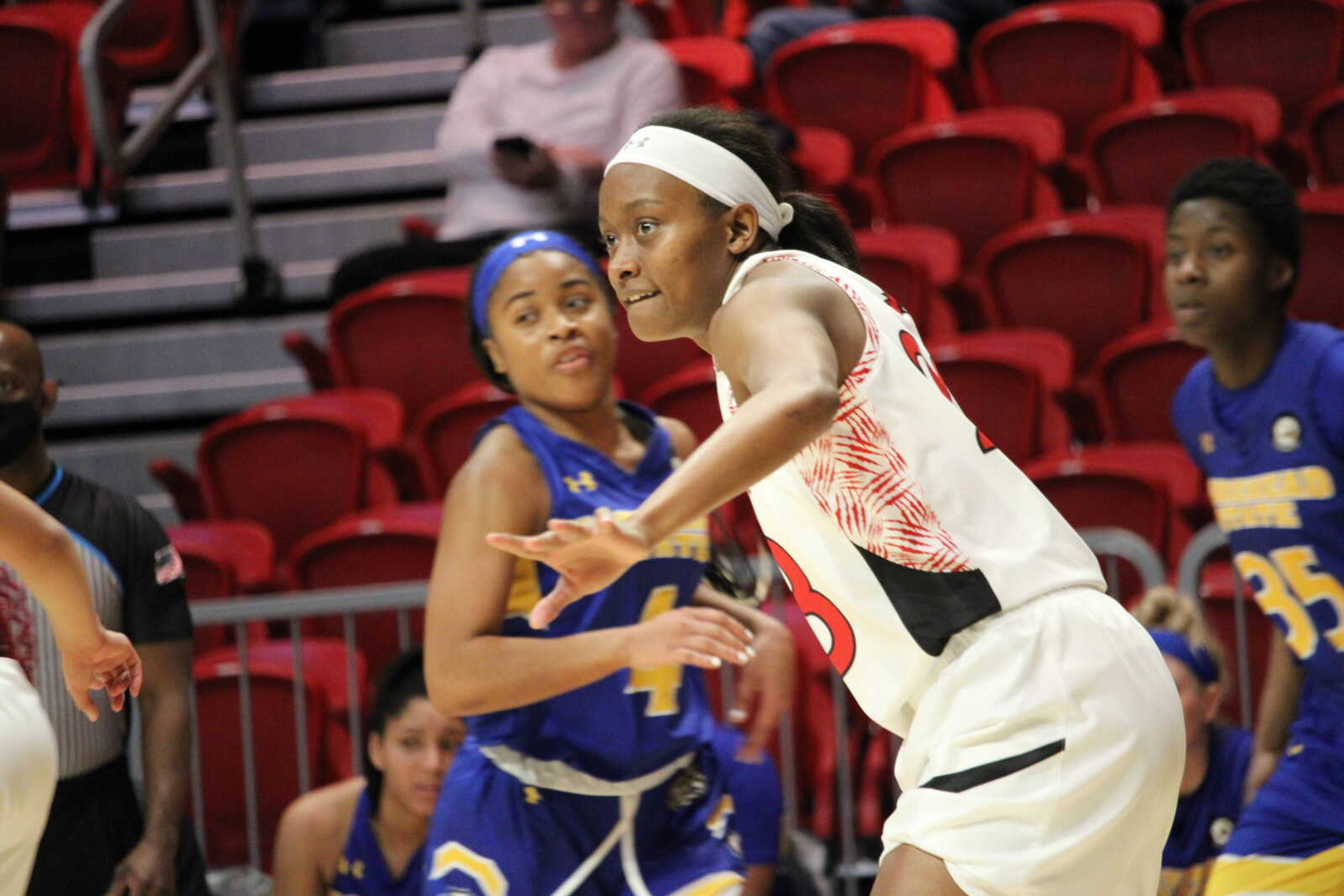 Senior guard Deanay Watson blocks out Morehead State players in the Redhawks' game on Jan. 27. Watson finished the game with a double-double.