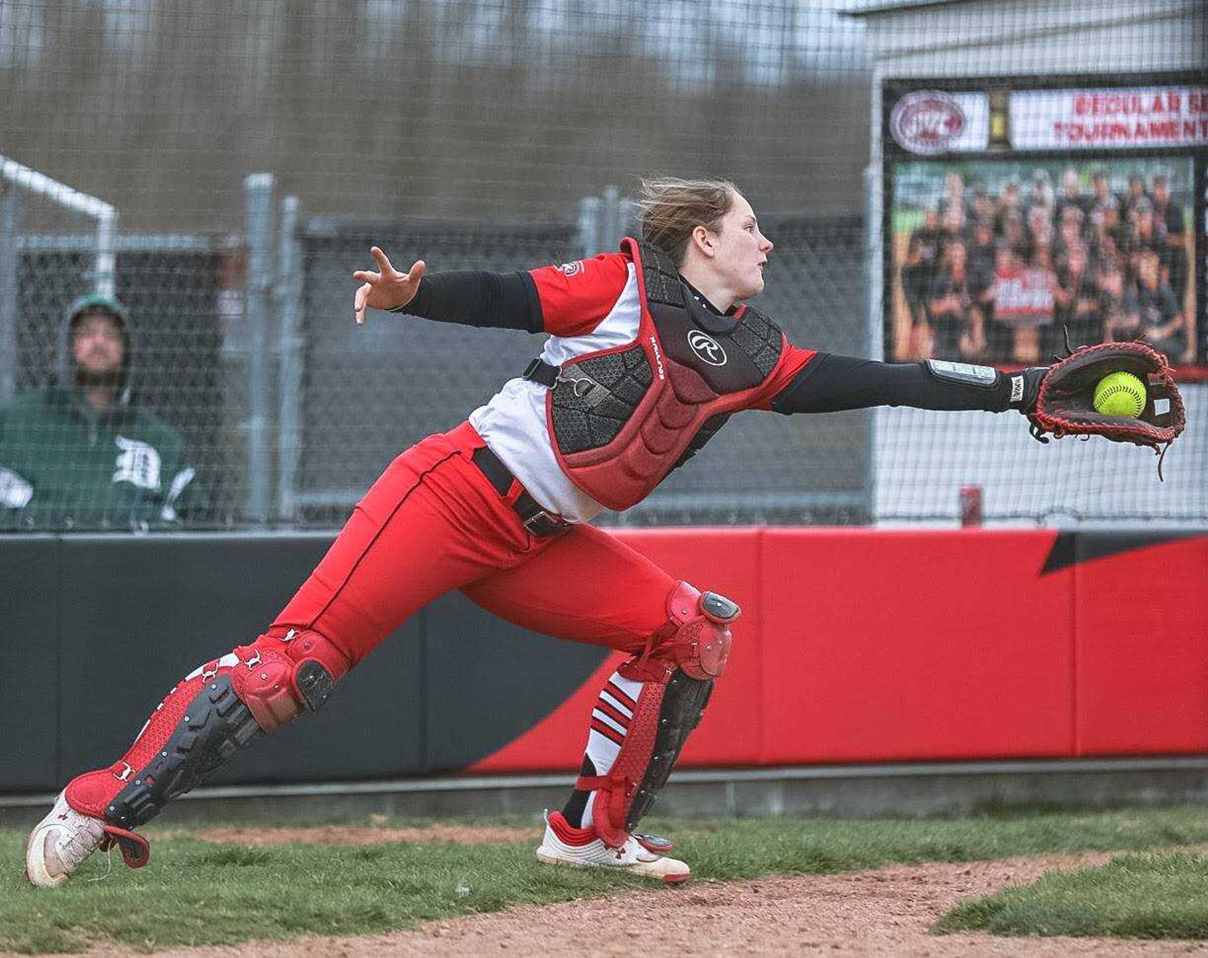 Senior Rachel Donald stretching out for a pop fly on March 1 at the Softball Complex.