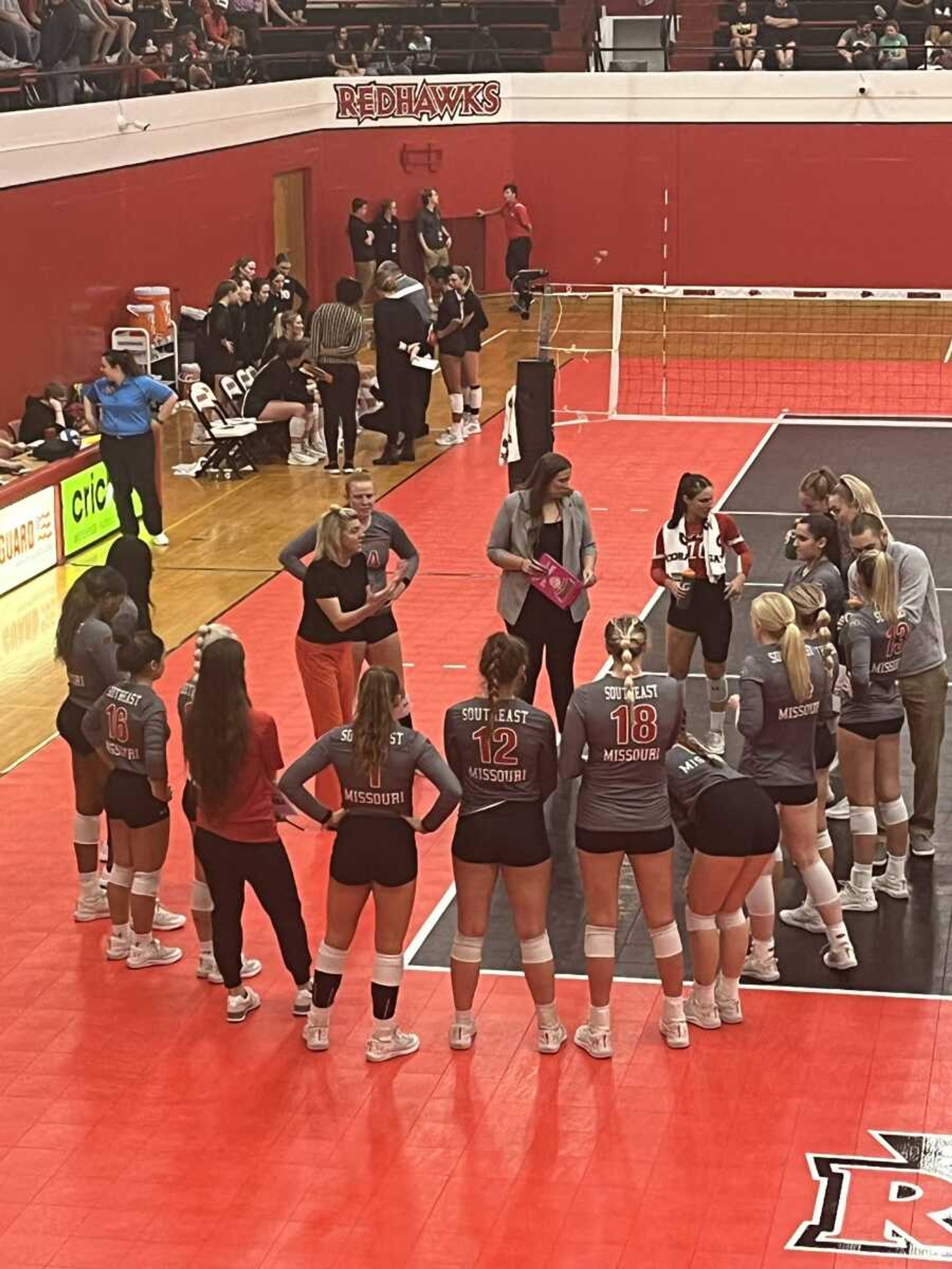 SEMO head coach Julie Yankus talks to her team during Friday's match against the SIUE Cougars.