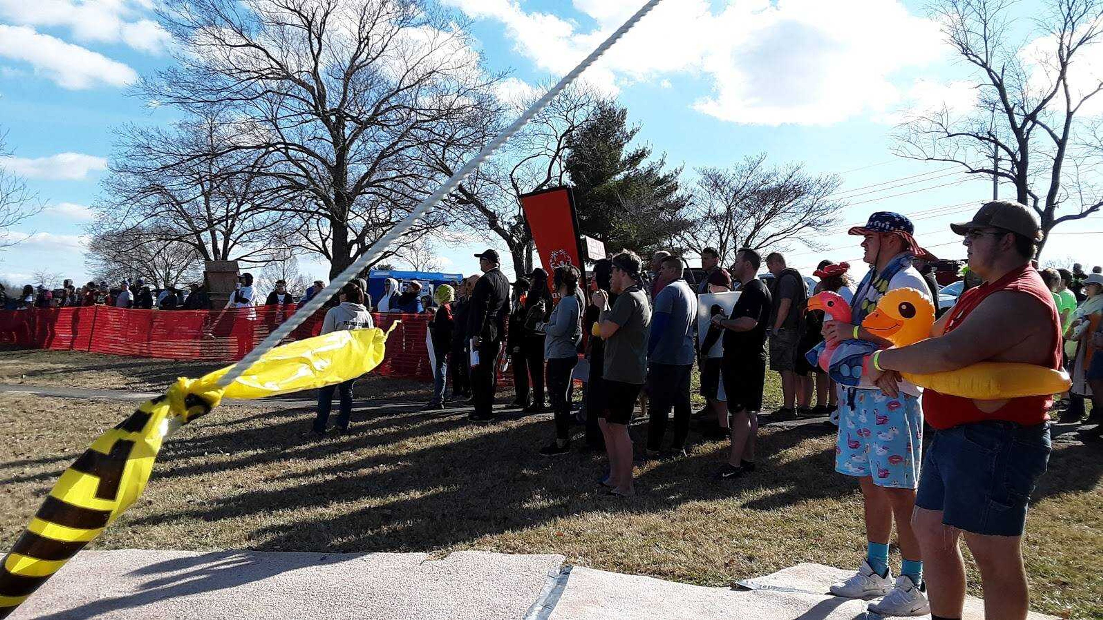 "Plungers" gather in line, assigned by heat number, to head into the waters for Special Olympics at the Cape Girardeau County Park North lake on Feb. 1.