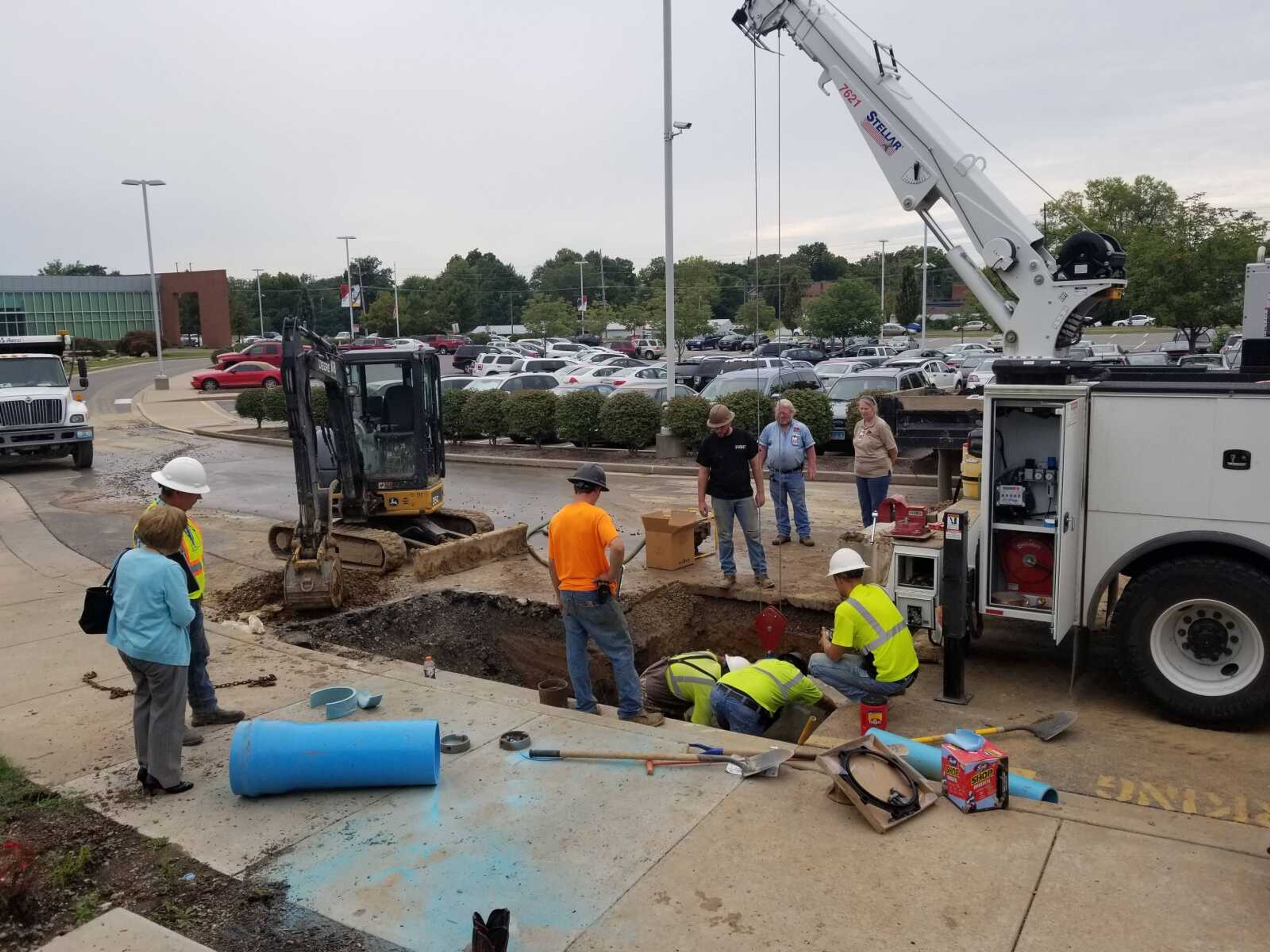Crews work to fix the broken water main on Sept. 12 at River Campus.