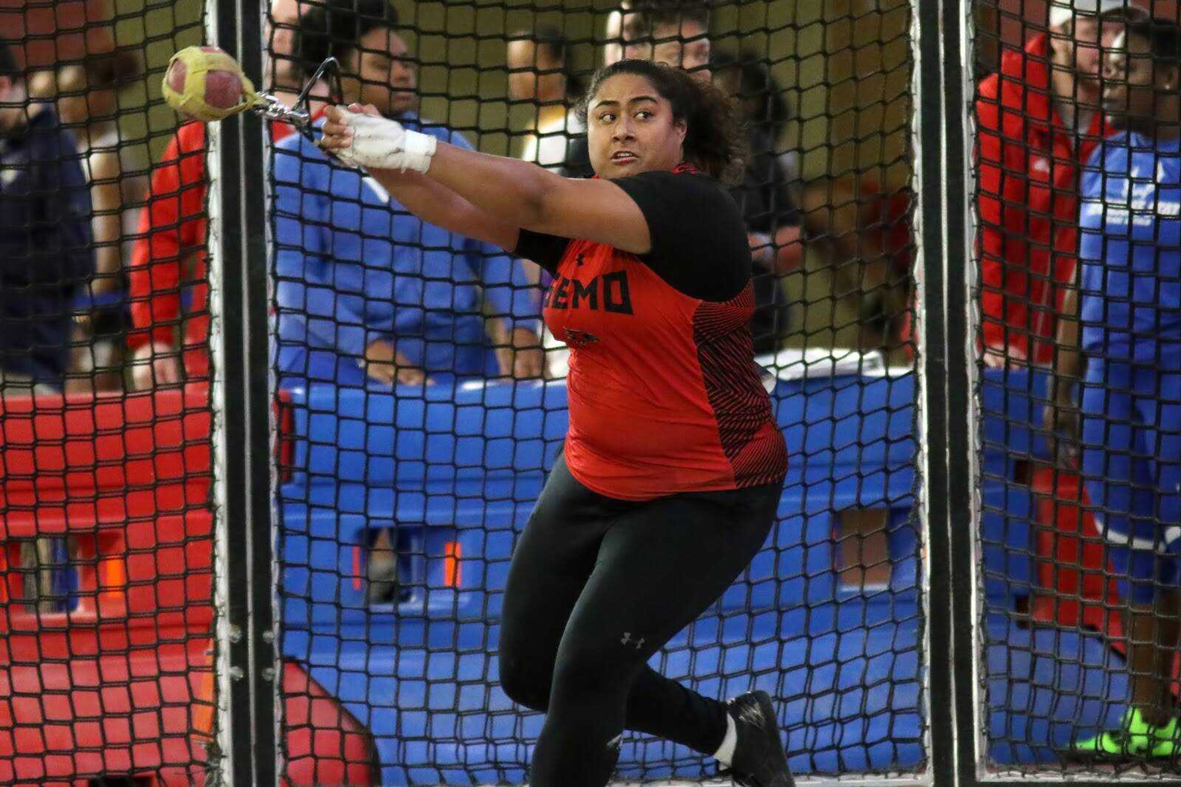 Anya Tonga throws during a meet.