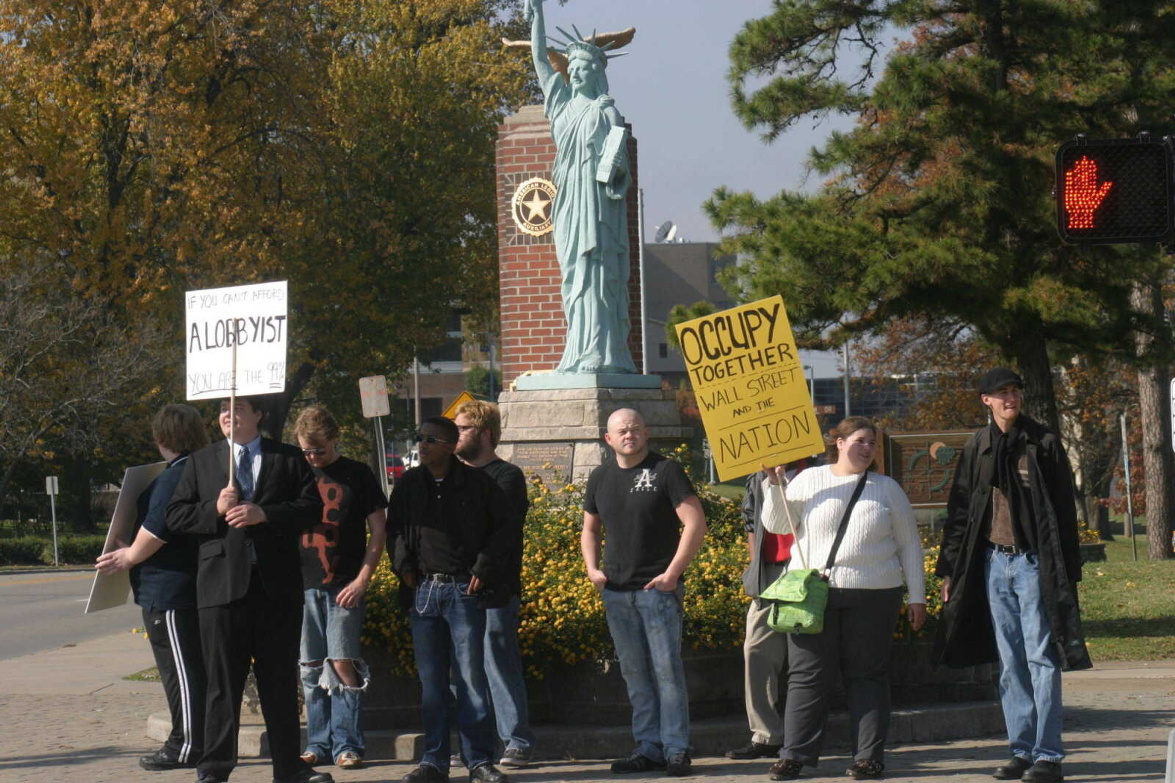 Occupy Wall Street in Cape Girardeau began on Nov. 5 when around a dozen people marched through the downtown area to protest.  - Photo by Sarah J. Semmler