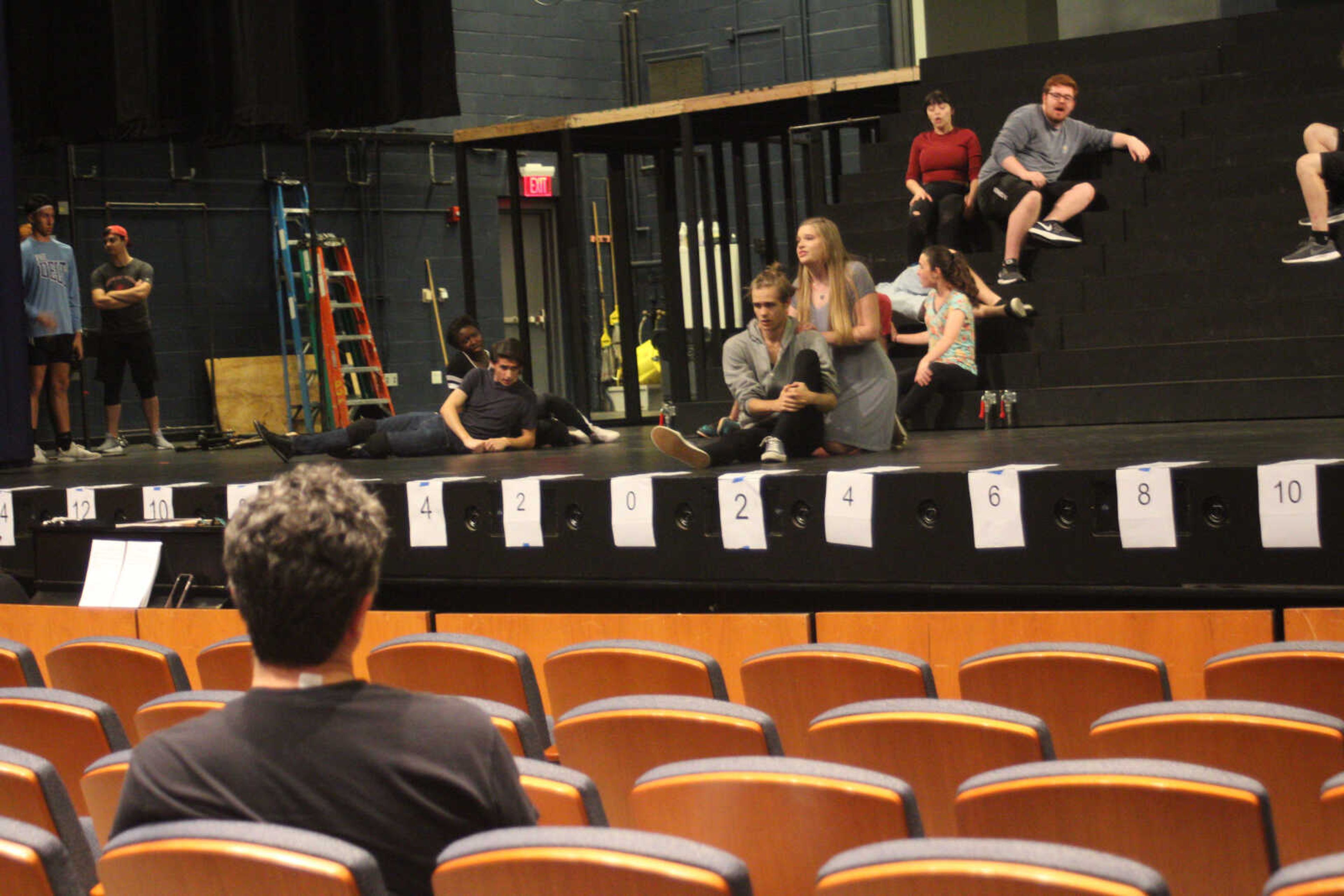 Director Mac McIntosh (left) looks on at rehearsal in the Bedell Performance Hall for “Jesus Christ Superstar.”