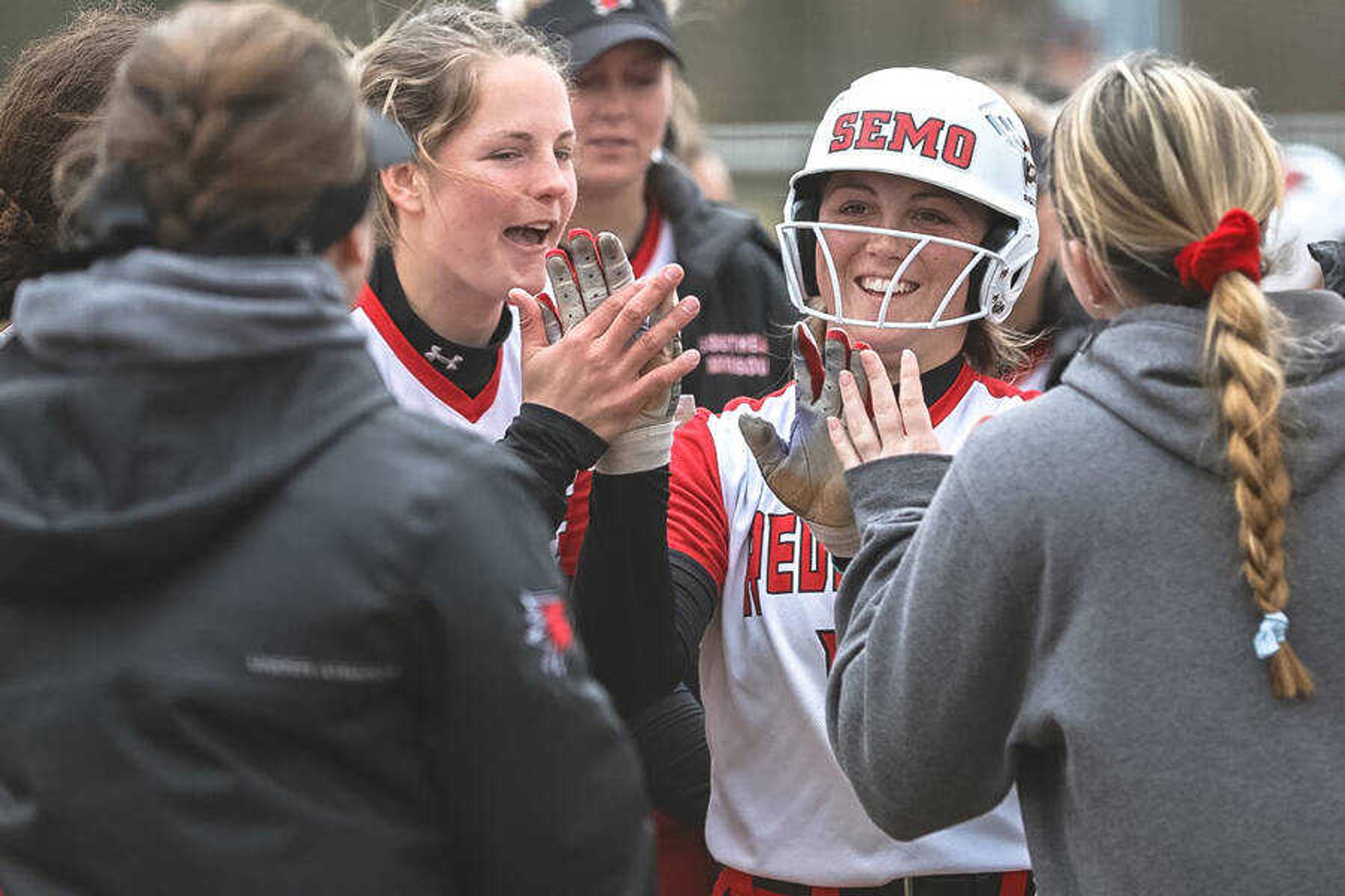 Junior Kaylee Anderson celebrates with teammates after hitting a home run against UMKC on March 1, 2020. This season, the Redhawks will take on four power-five conference schools all from the SEC.