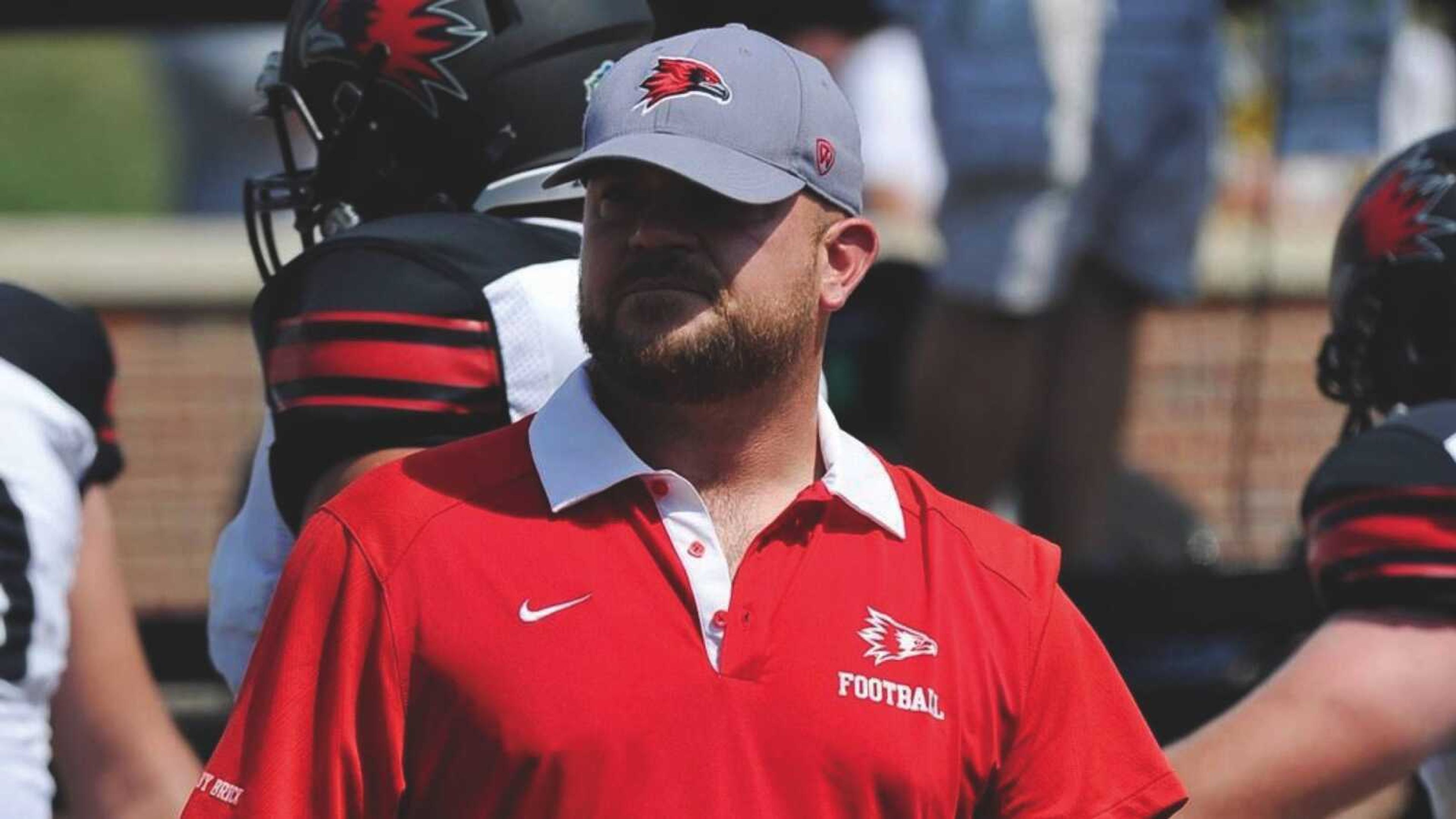 Jon Weimers on the sideline as offensive line coach last season during a Southeast football game.