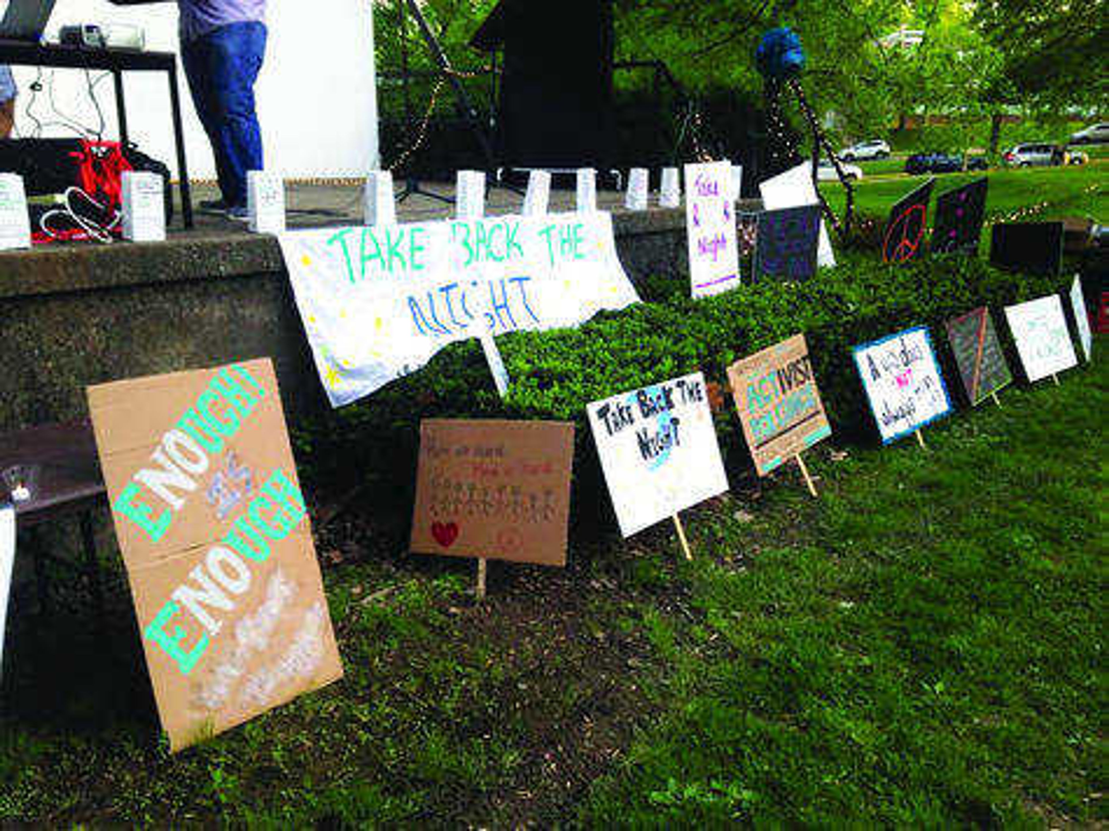 Signs were made by students the day before the "Take Back the Night" walk at an event in the University Center. Photo by Amber Cason