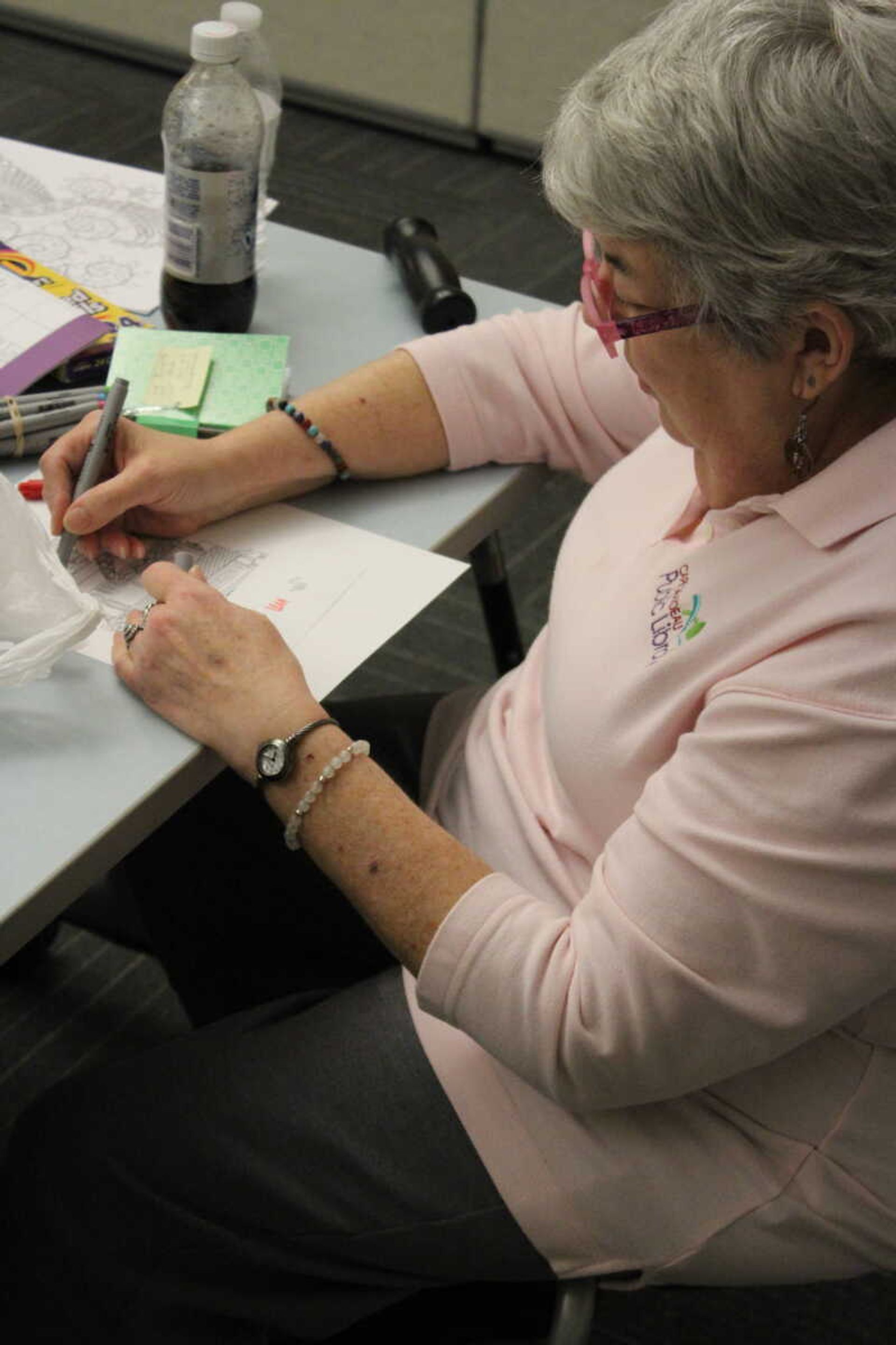 Marilyn Hutchings colors in her design at Cape Girardeau Public Library’s “Coloring for Adults” event on Oct. 24.