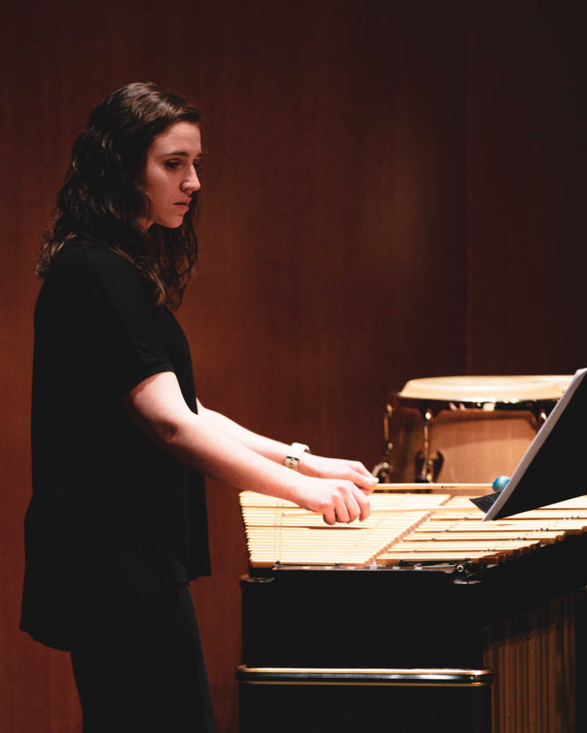 Auxiliary percussionist Alisah Coots playing the xylophone during the 22nd Annual Clark Terry/Phi Mu Alpha Jazz Festival Gala Concert on Feb. 7 in Bedell Performance Hall in Cape Girardeau, Mo.