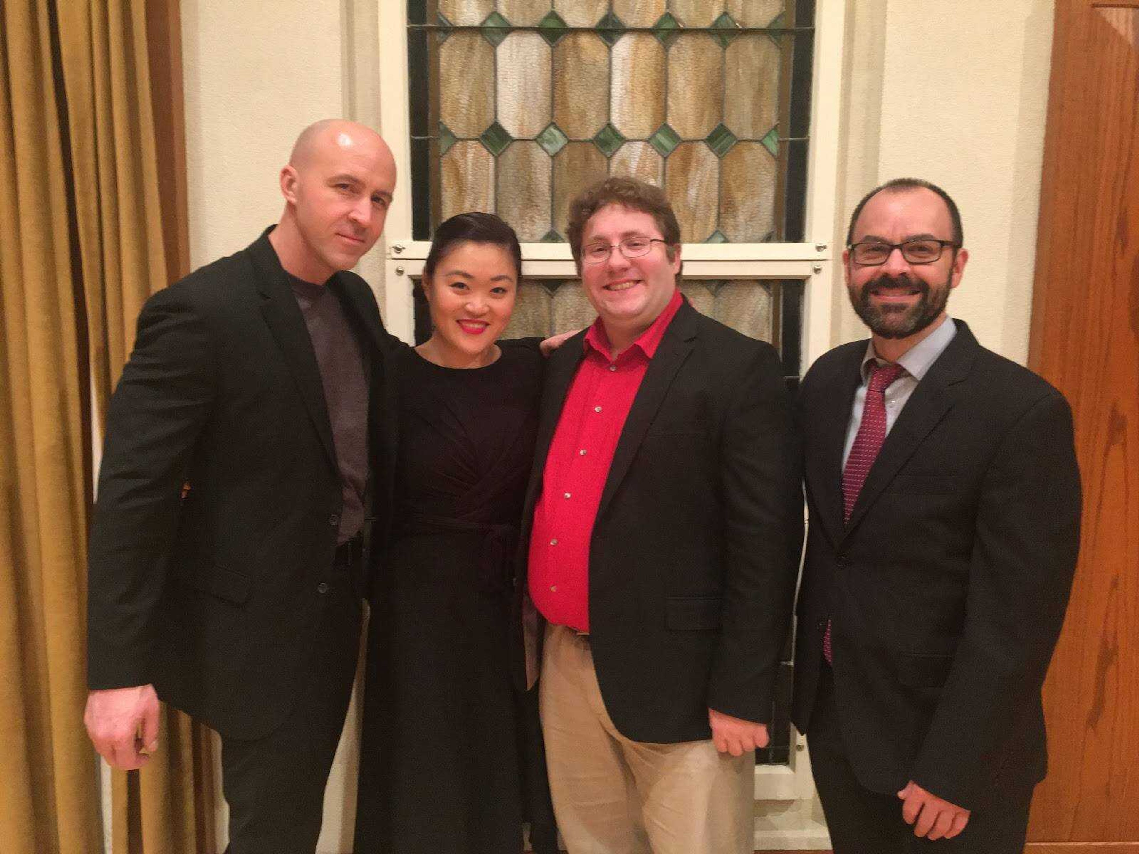 Performers Matt Yount, Sophia Han, Galen Dean Peiskee Jr. and Brent Williams smile after their performance on Feb. 29 at Shuck Recital Hall in Cape Girardeau, Missouri.