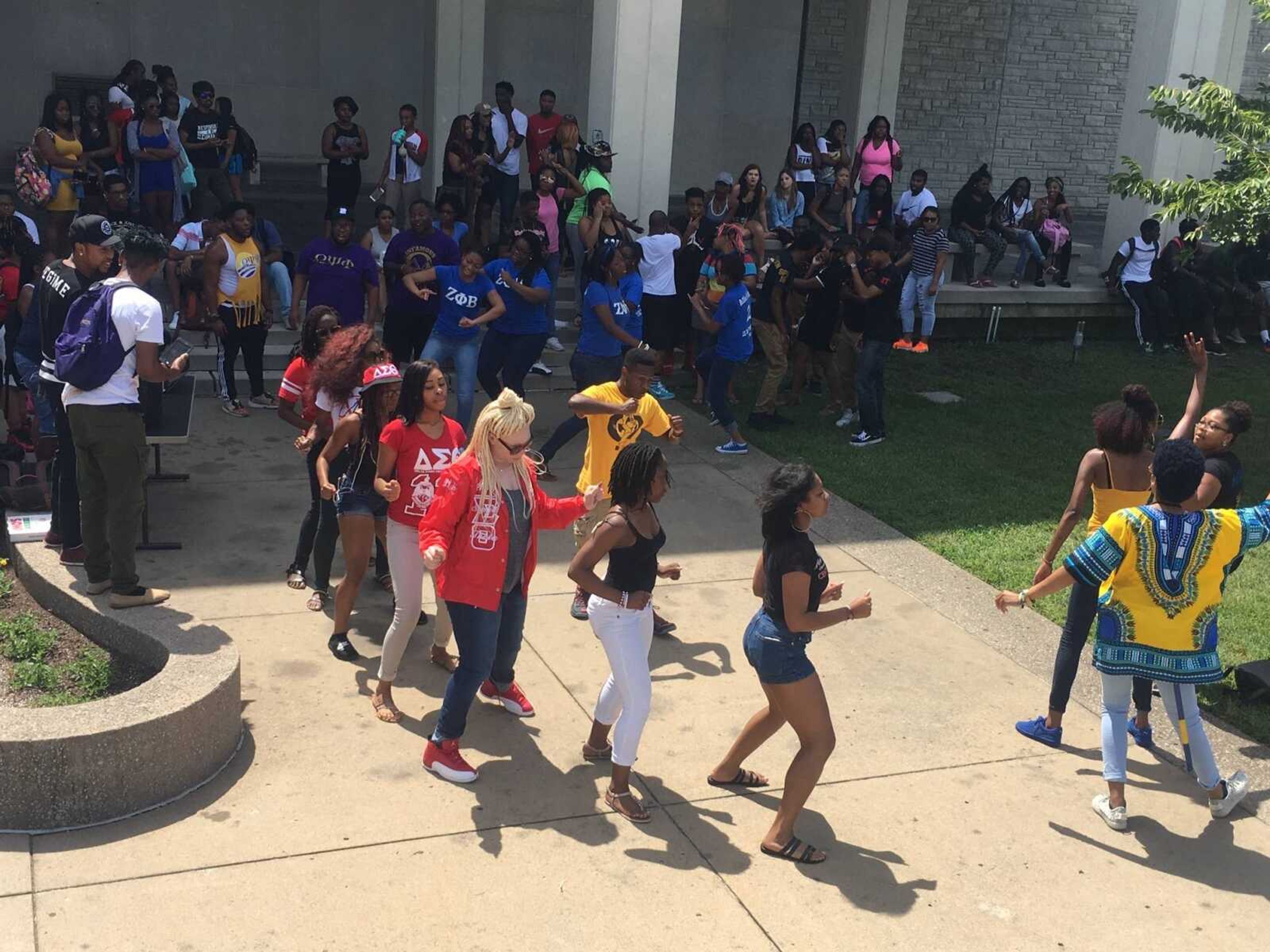 On Aug. 24, Jada Wan lead a stroll with members of her organization Sigma Gamma Rho Sorority Inc. Bethany Ferguson, Nyara Williams and Di'Shae Johnson during common hour in front of Kent Library.