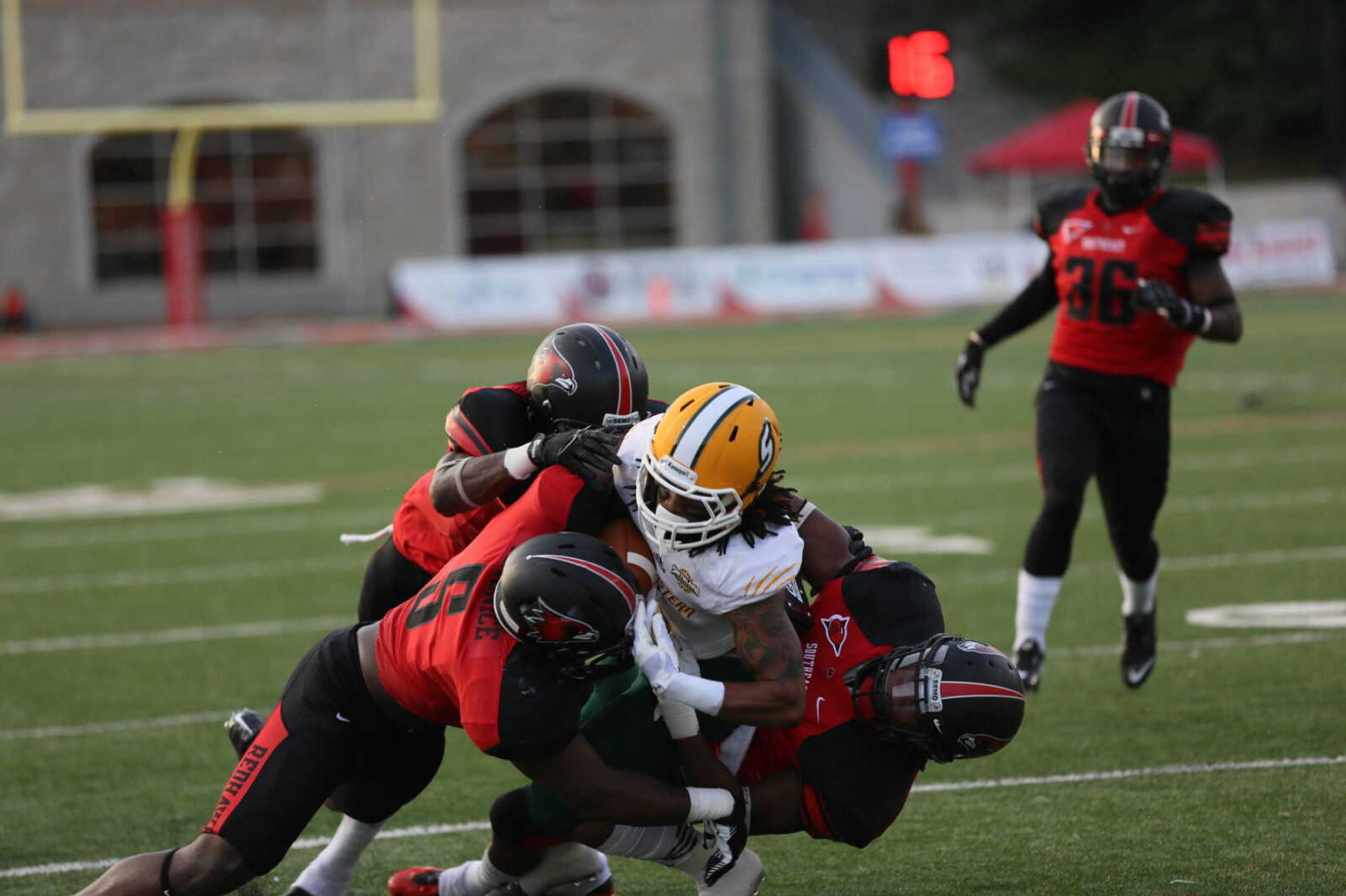 The Southeast Missouri State University Redhawks tackle a Southern Louisiana player. Photo by Jegenaath Mudaliar