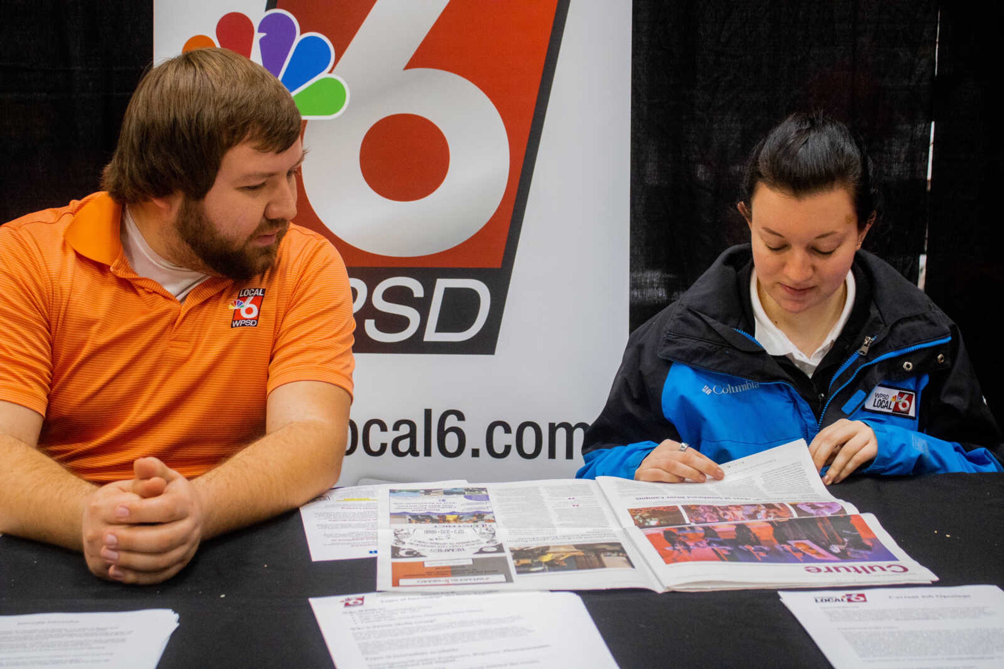 WPSD News Crew reading the latest version of the Southeast Arrow paper at the Career Expo, Thursday March 5th, 2020 at the Show Me Center in Cape Girardeau, Mo.