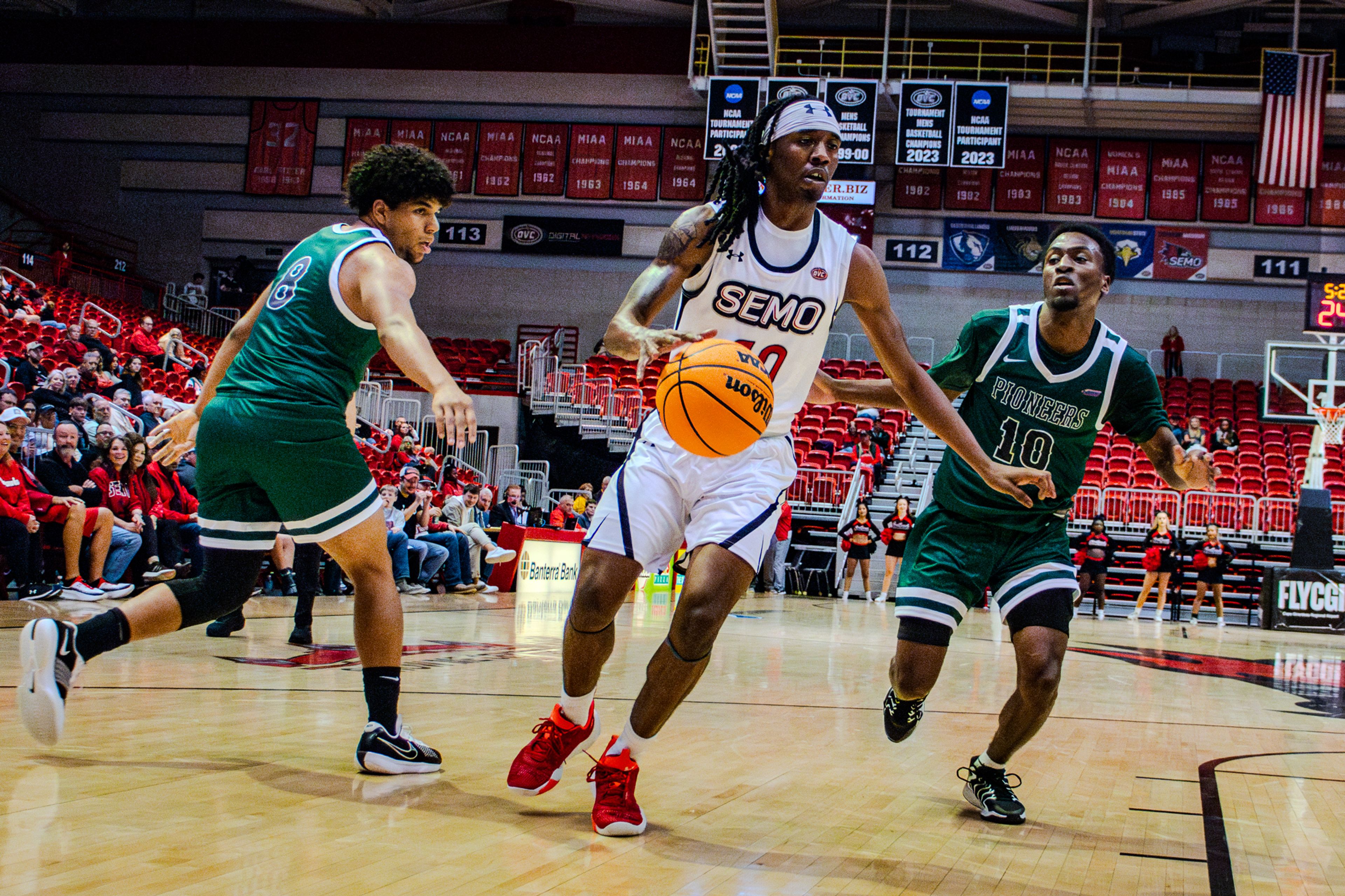 Senior guard Teddy Washington Jr. drives to the basket against Crowley Ridge College. 