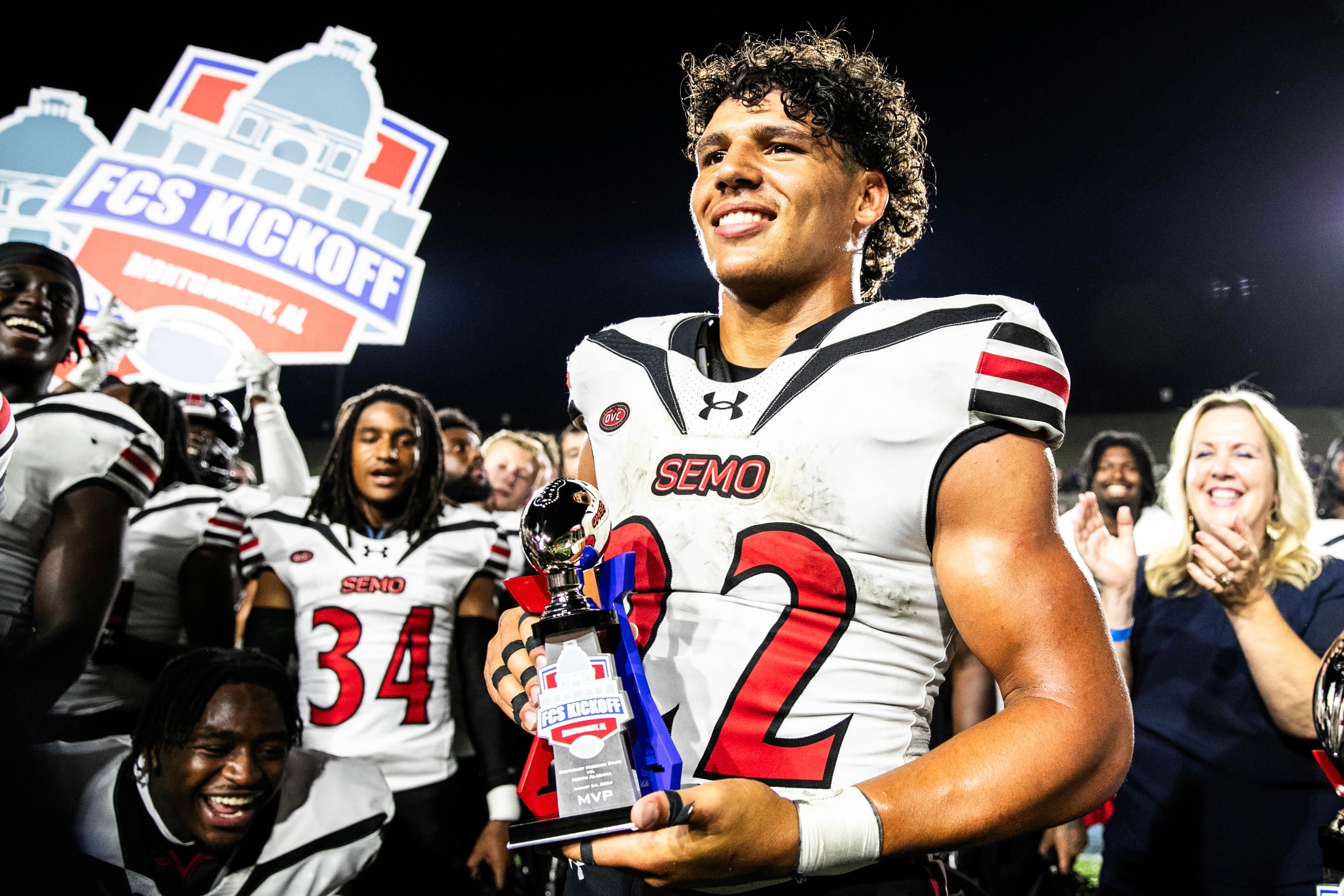 Freshman running back Payton Brown smiles after receiving the Most Valuable Player award at the FCS Kickoff. 