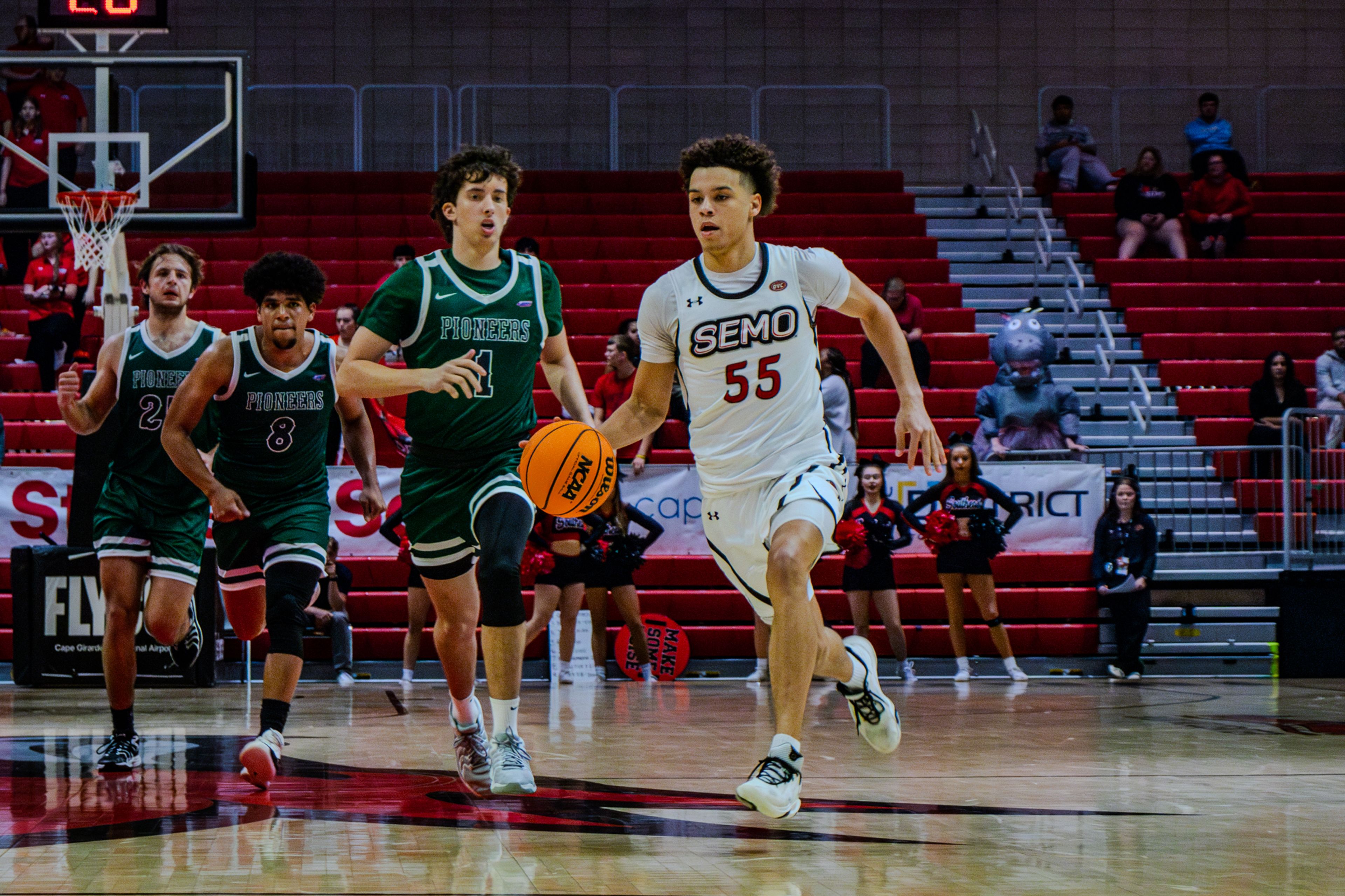 Sophomore guard Marqueas Bell drives down the court against Crowley Ridge college. 