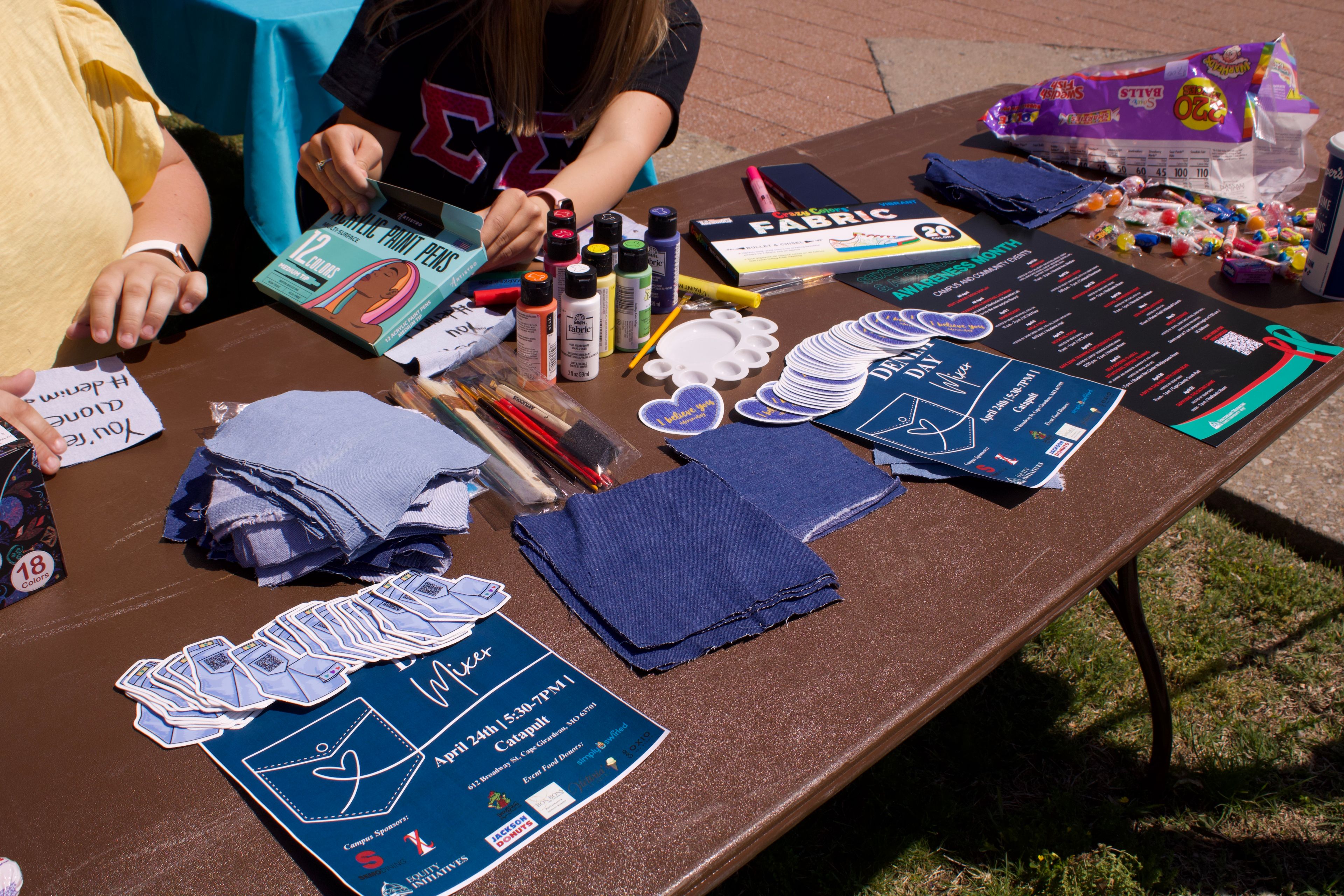 Stickers and Denim swatches at the Denim Day Resource Fair. 
