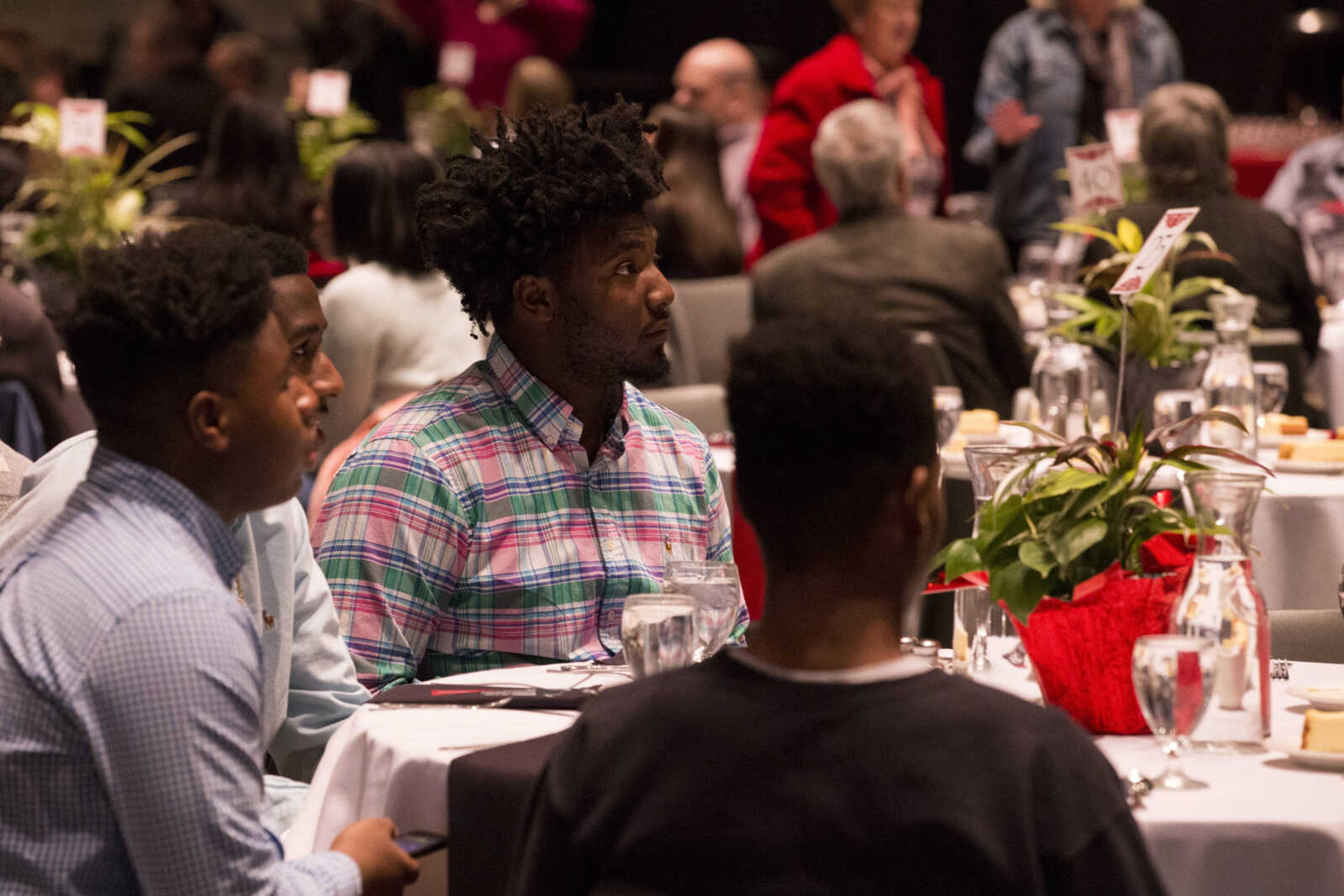 Attendees of the Jan. 17, 2018 Martin Luther King Jr. Celebration Dinner at 7 p.m. sit together.