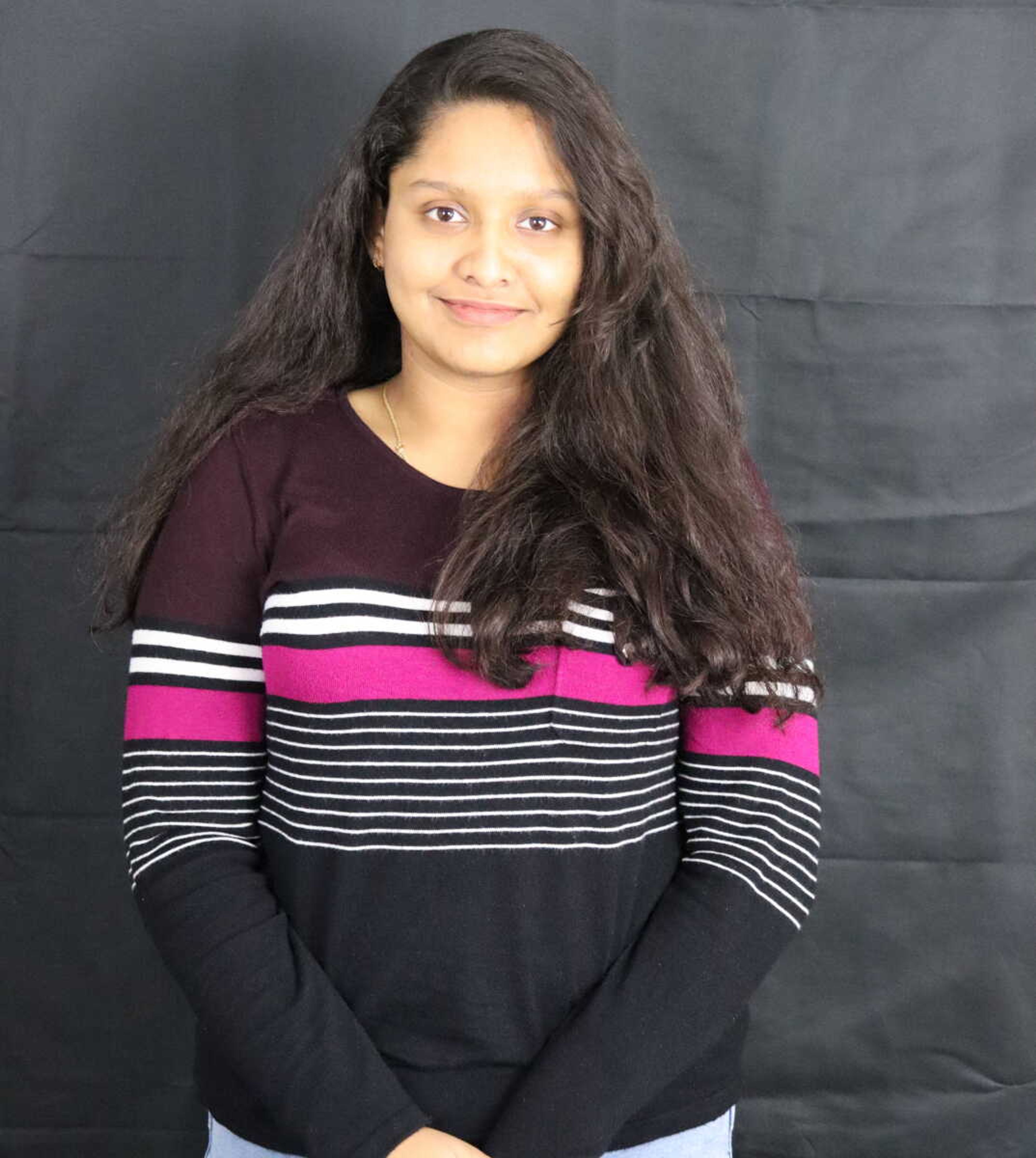 Lamia Khan is a student from Bangladesh, and she is currently studying elementary education.