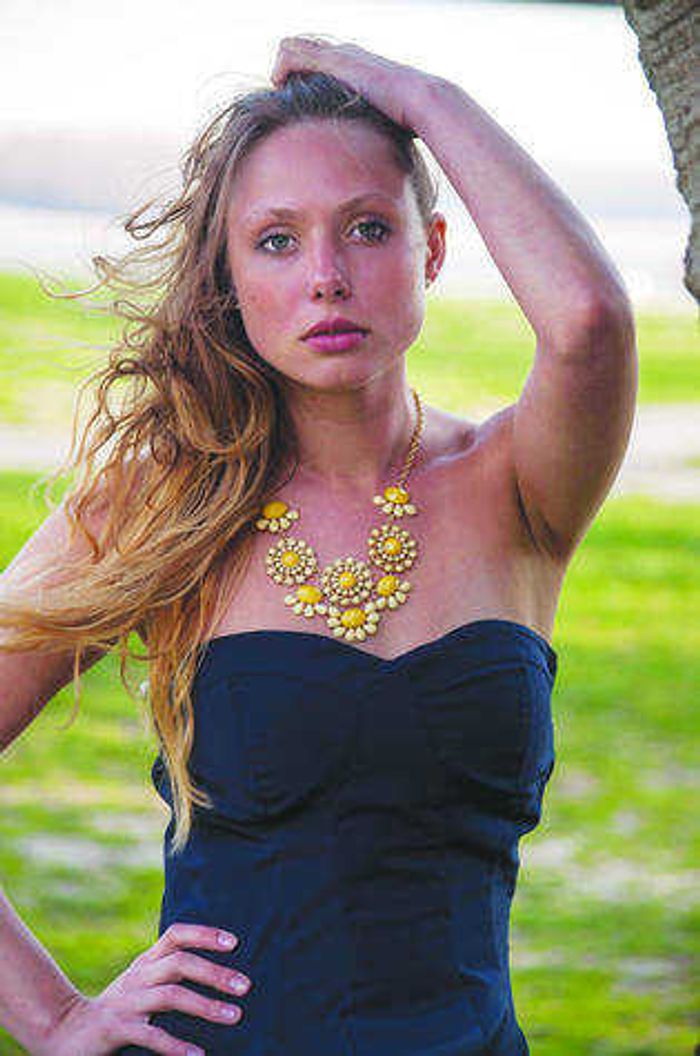 Yellow flower necklace and strapless top from Philanthropy. Photo by Alyssa Brewer