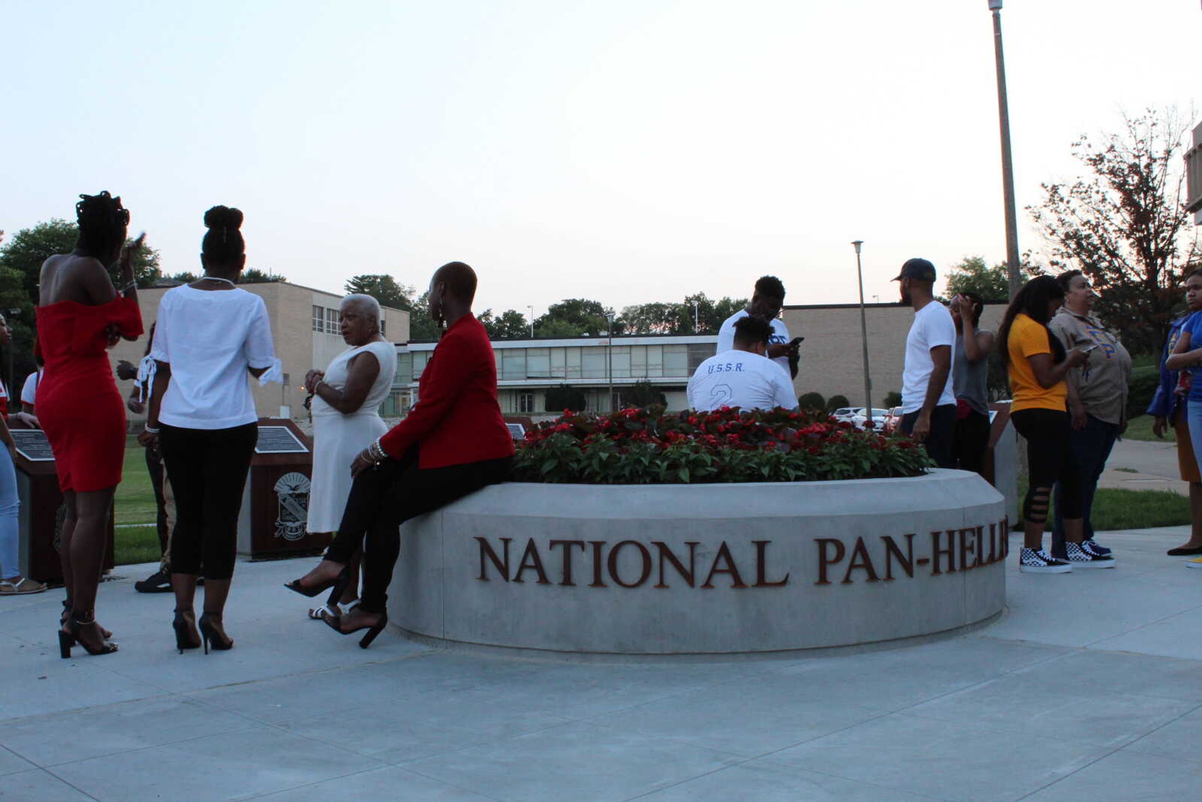 Attendees of the NPHC Plaza opening ceremony socialize and admire the new addition to Southeast's campus.