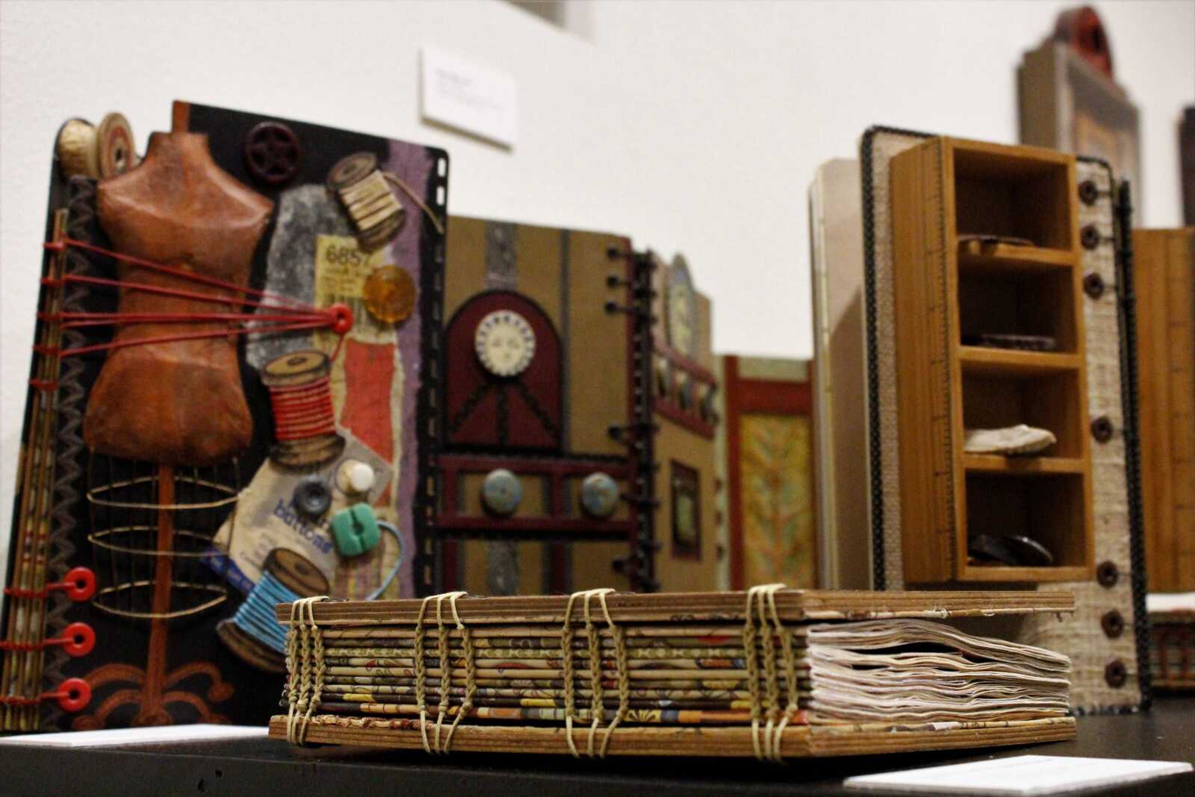 A decorated book set by Caroline Kahler sits on display during First Friday at River Campus.