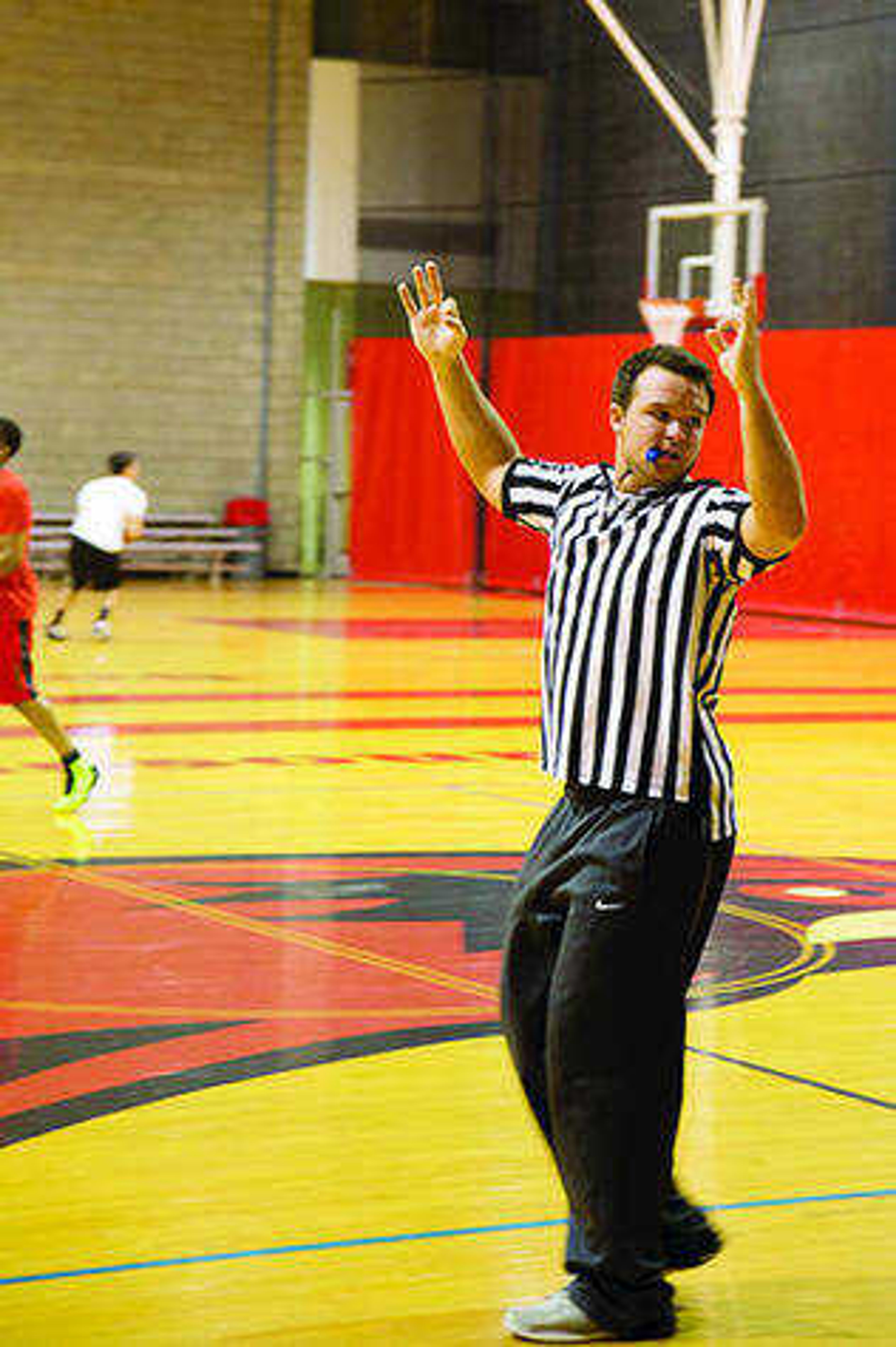 <b>Freshman Mark Cushing officiates the playoff between Sigma Phi Epsilon and Theta Xi fraternities.</b> Submitted photo