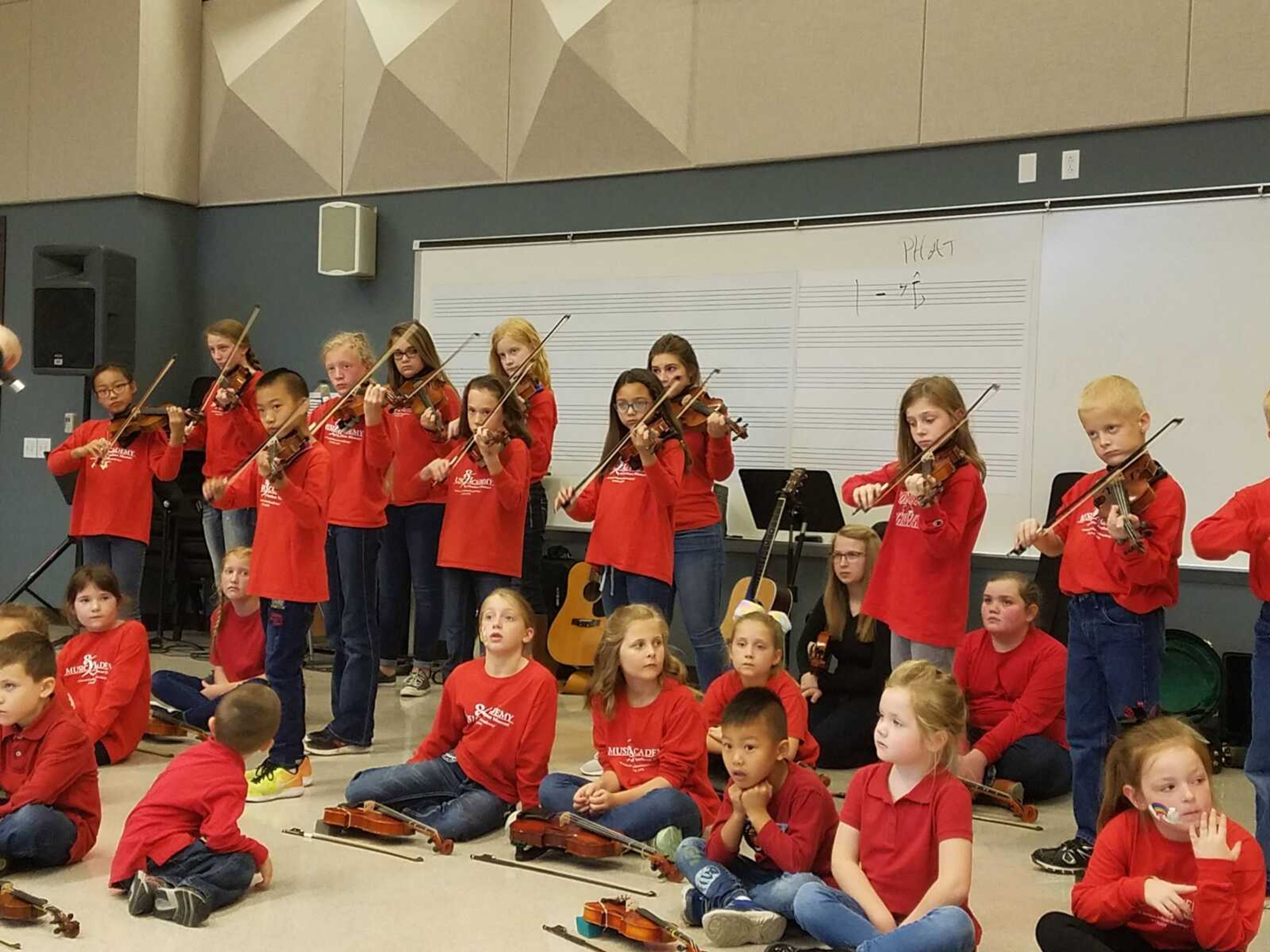 Southeast Music Academy held a family event Sunday, Oct. 22, to showcase their skills and encourage more involvement. Here, the Suzuki Strings class performs a recital for family and community members.