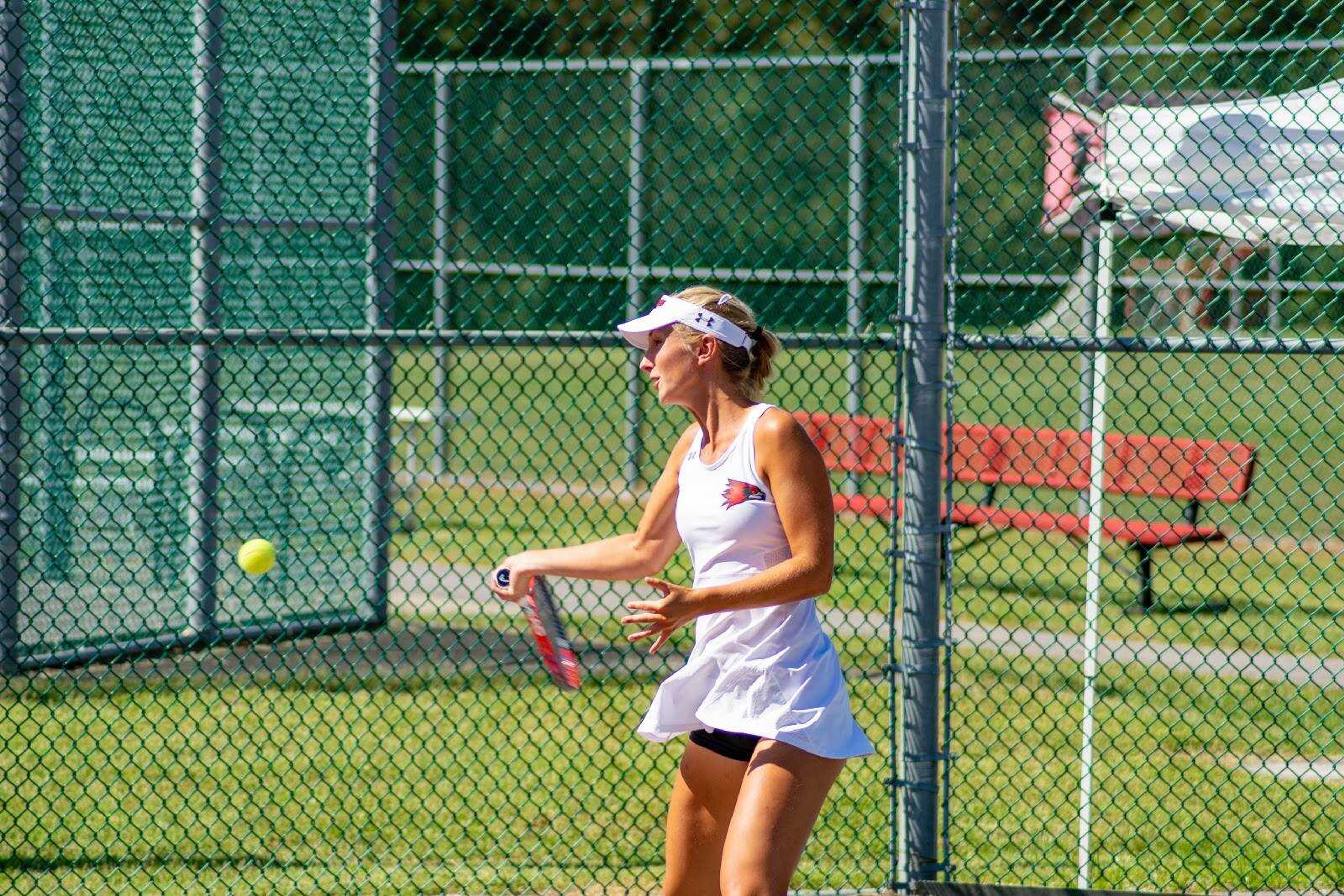 Junior Maja Lundell hits the ball back to her William Woods University opponent on Oct. 5 at the Redhawks Tennis Complex.